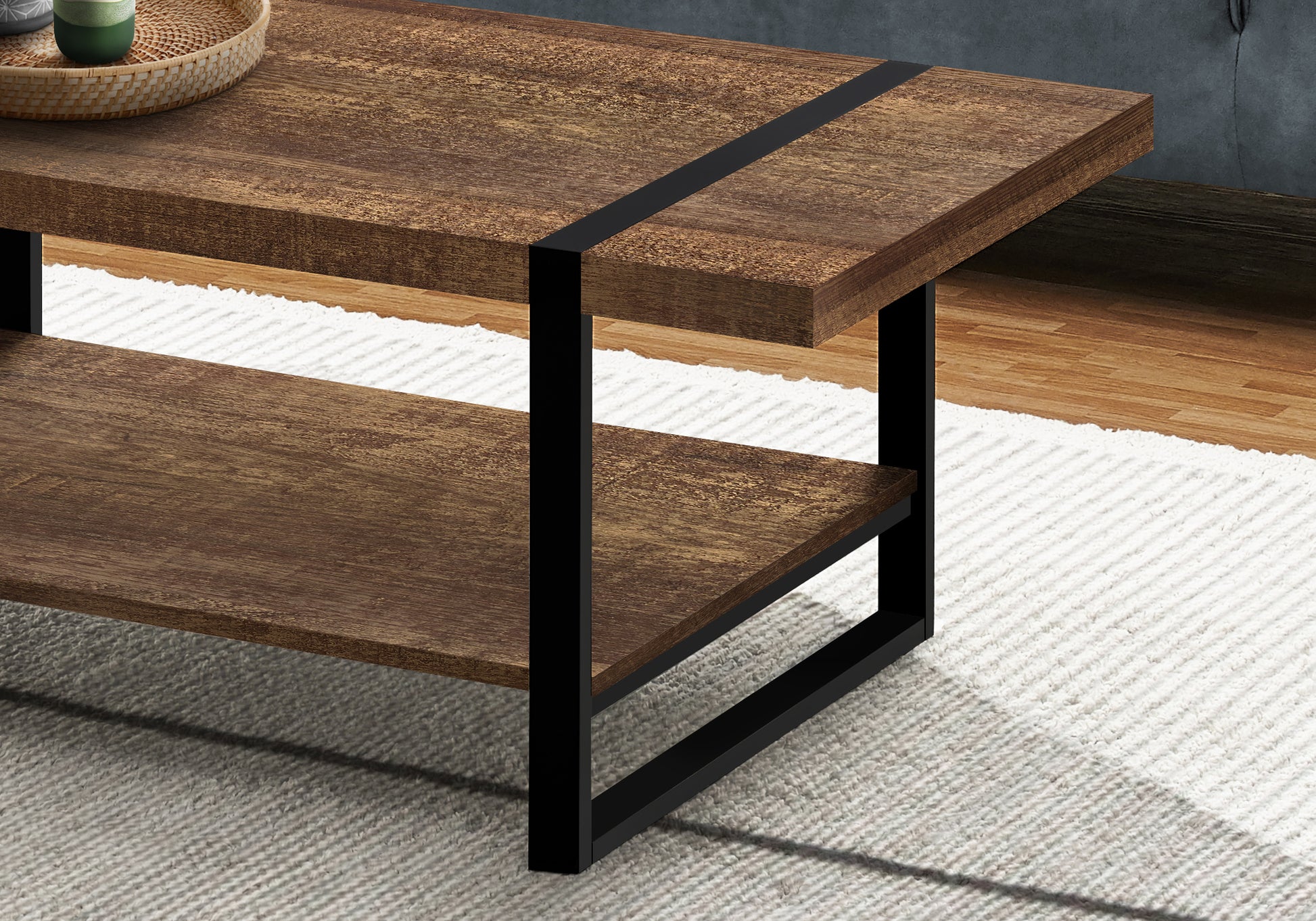 Rustic wood coffee table with black metal legs and a lower shelf