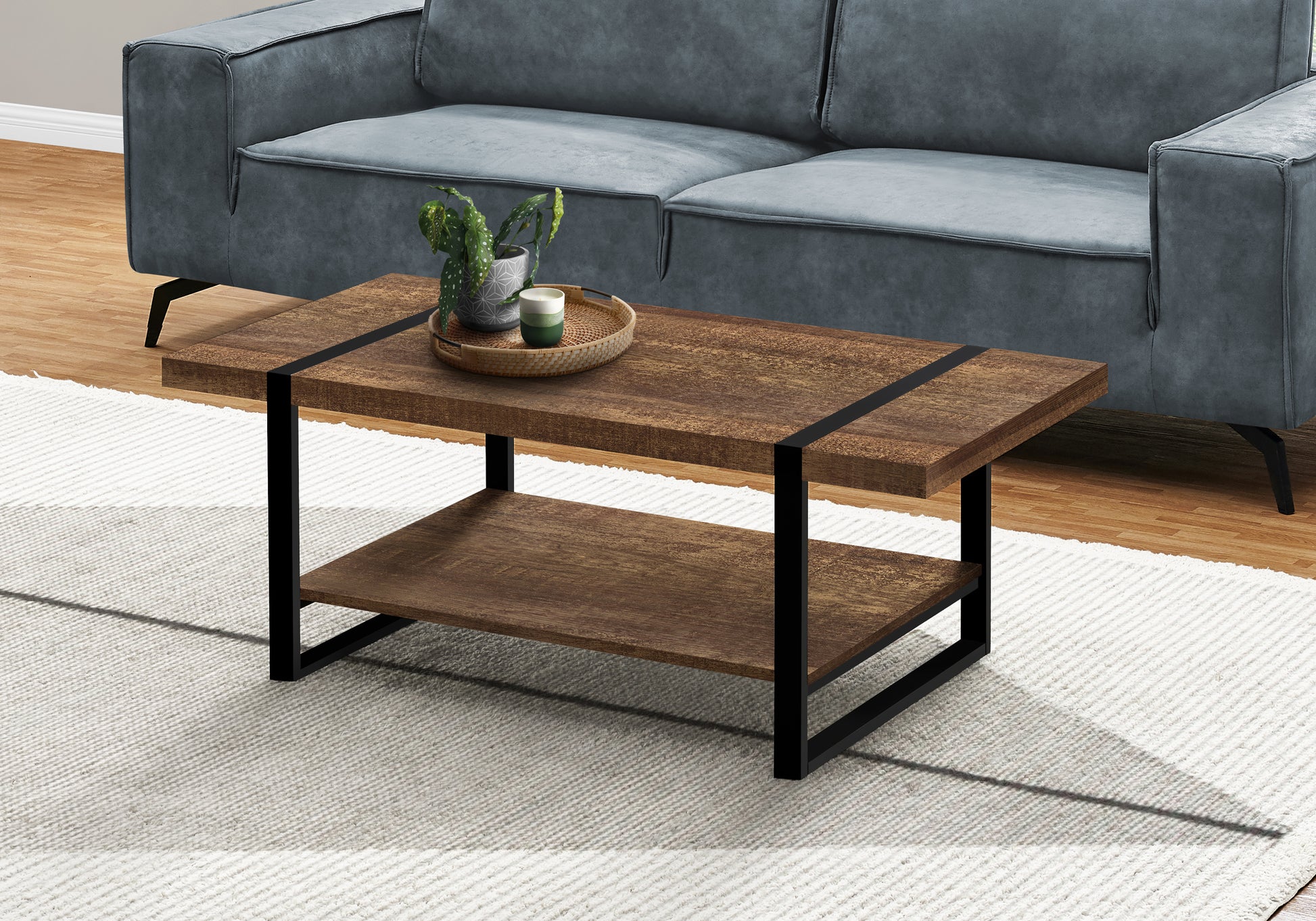 Rustic brown wood coffee table with two tiers and black metal frame