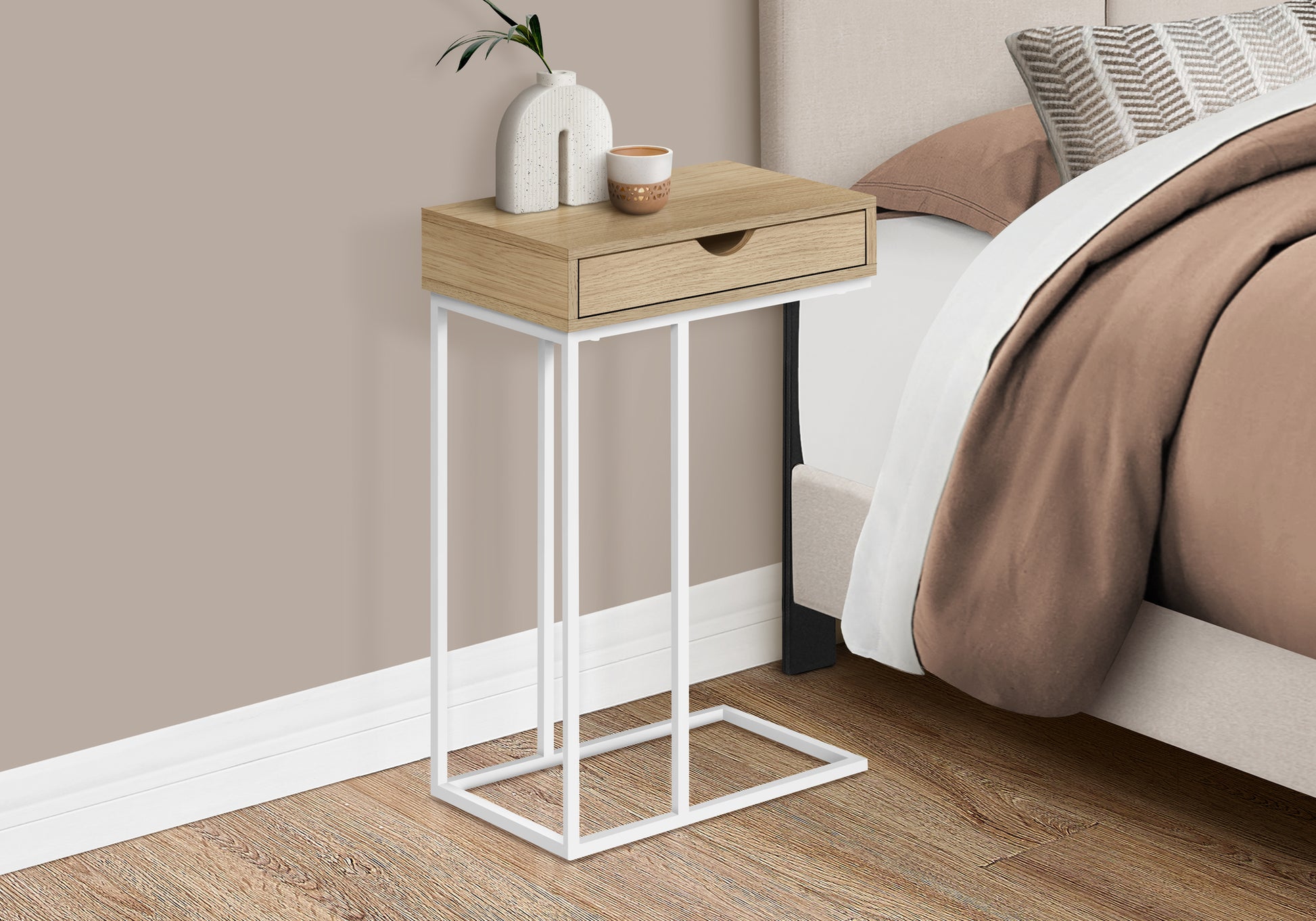 Slim Ctable with light oak drawer and white metal frame beside bed