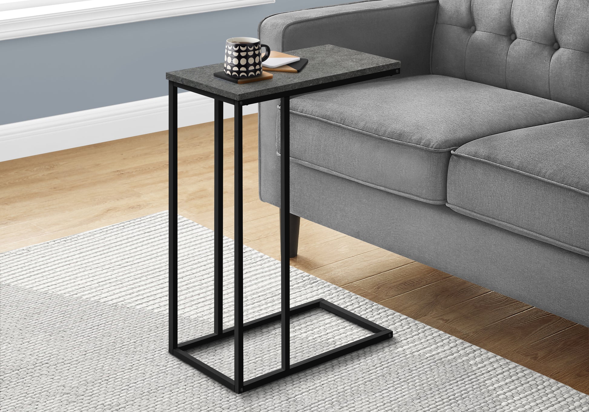 Gray faux stone Ctable with black metal frame perfect for small spaces