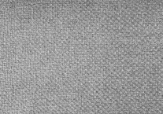 Closeup of a textured grey linen fabric with a subtle weave pattern