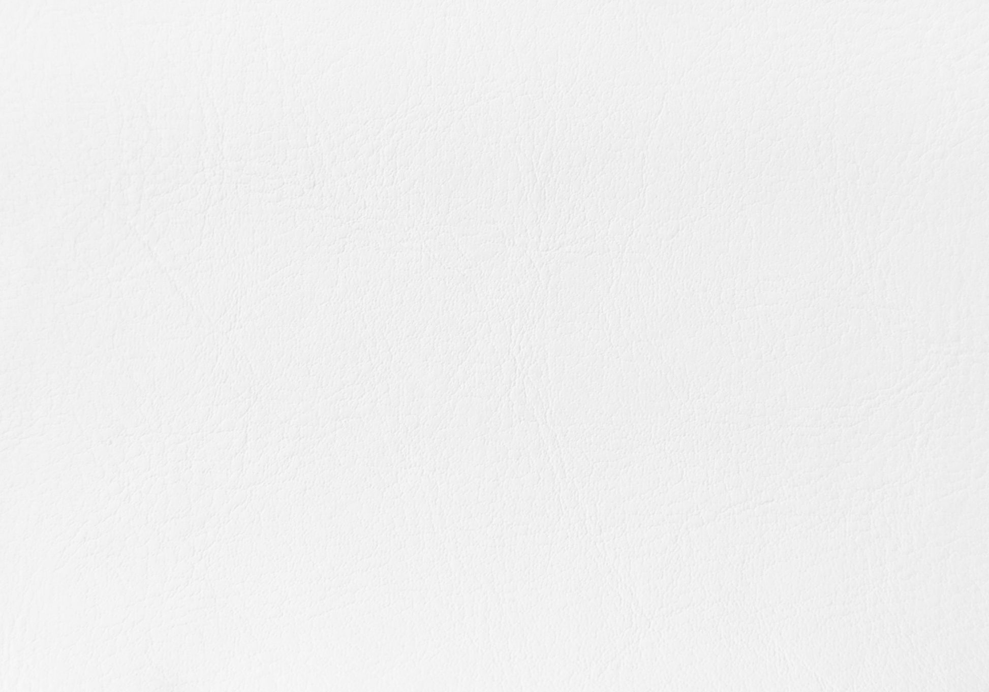 Closeup of textured white leather material for upholstery projects