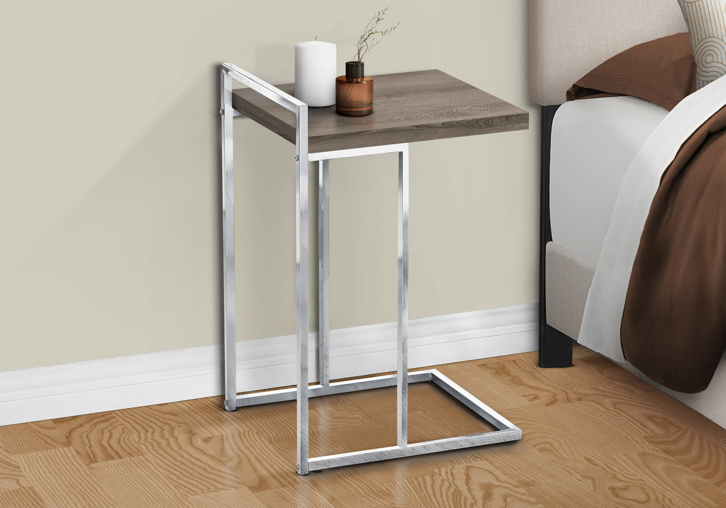 Grey wood grain C table with chrome frame perfect for bedside use