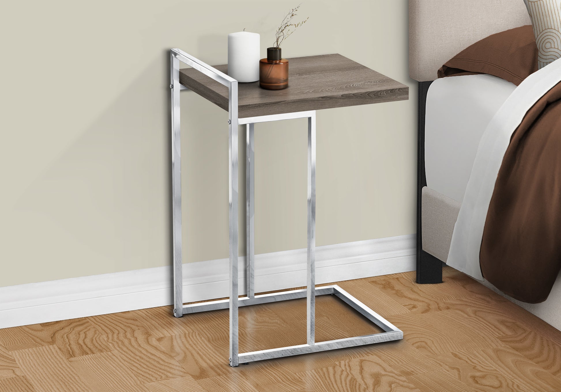 Grey wood grain C table with chrome frame perfect for bedside use