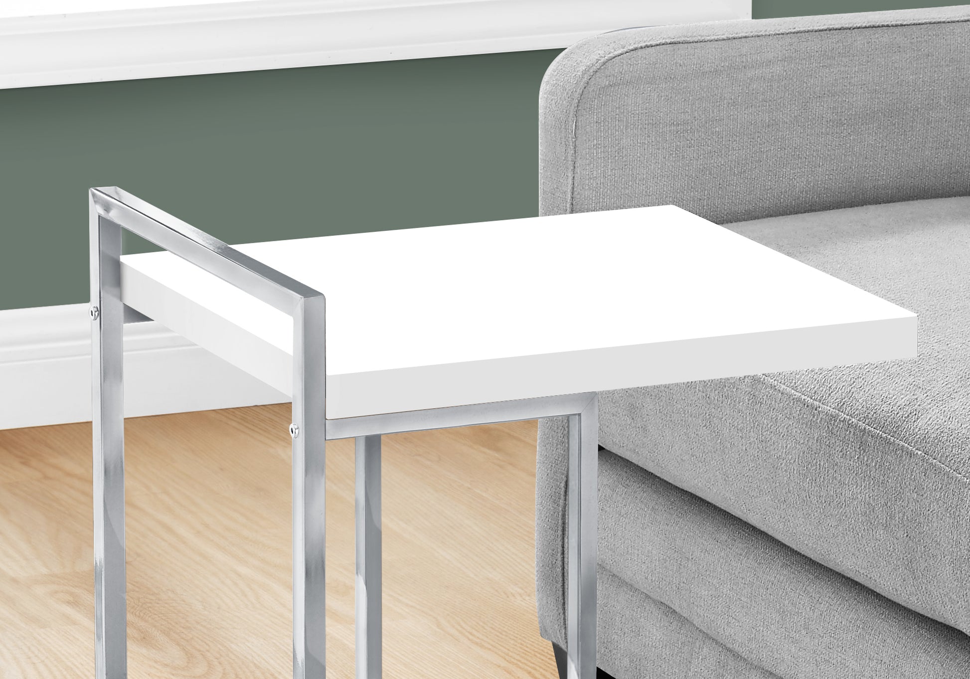 White Ctable with chrome frame perfect for living room beside couch