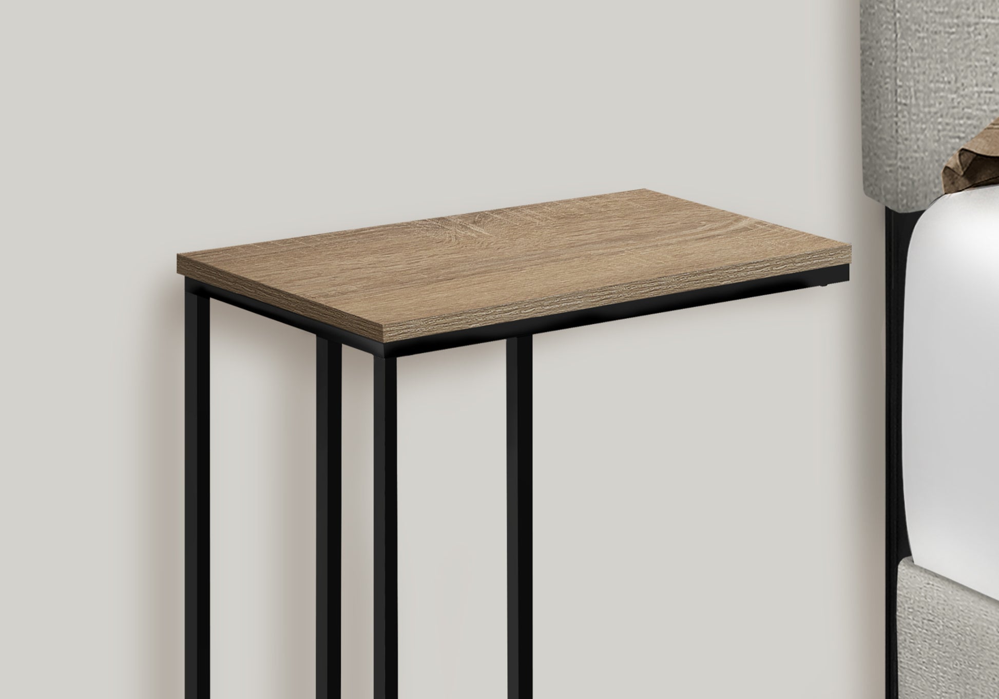Slim wooden side table with black metal frame perfect for small spaces