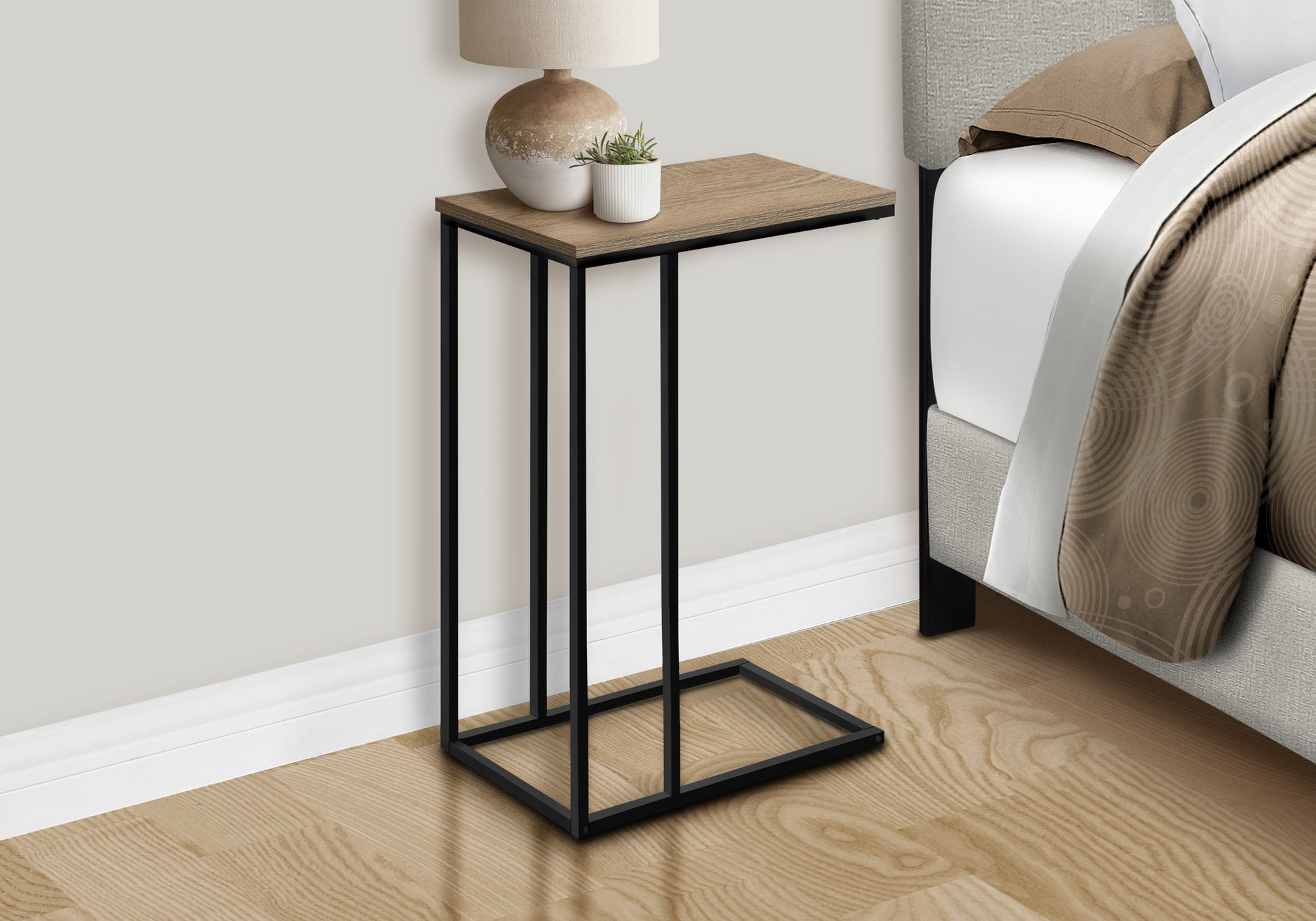Modern ctable with oakeffect top and black metal frame perfect for bedside use