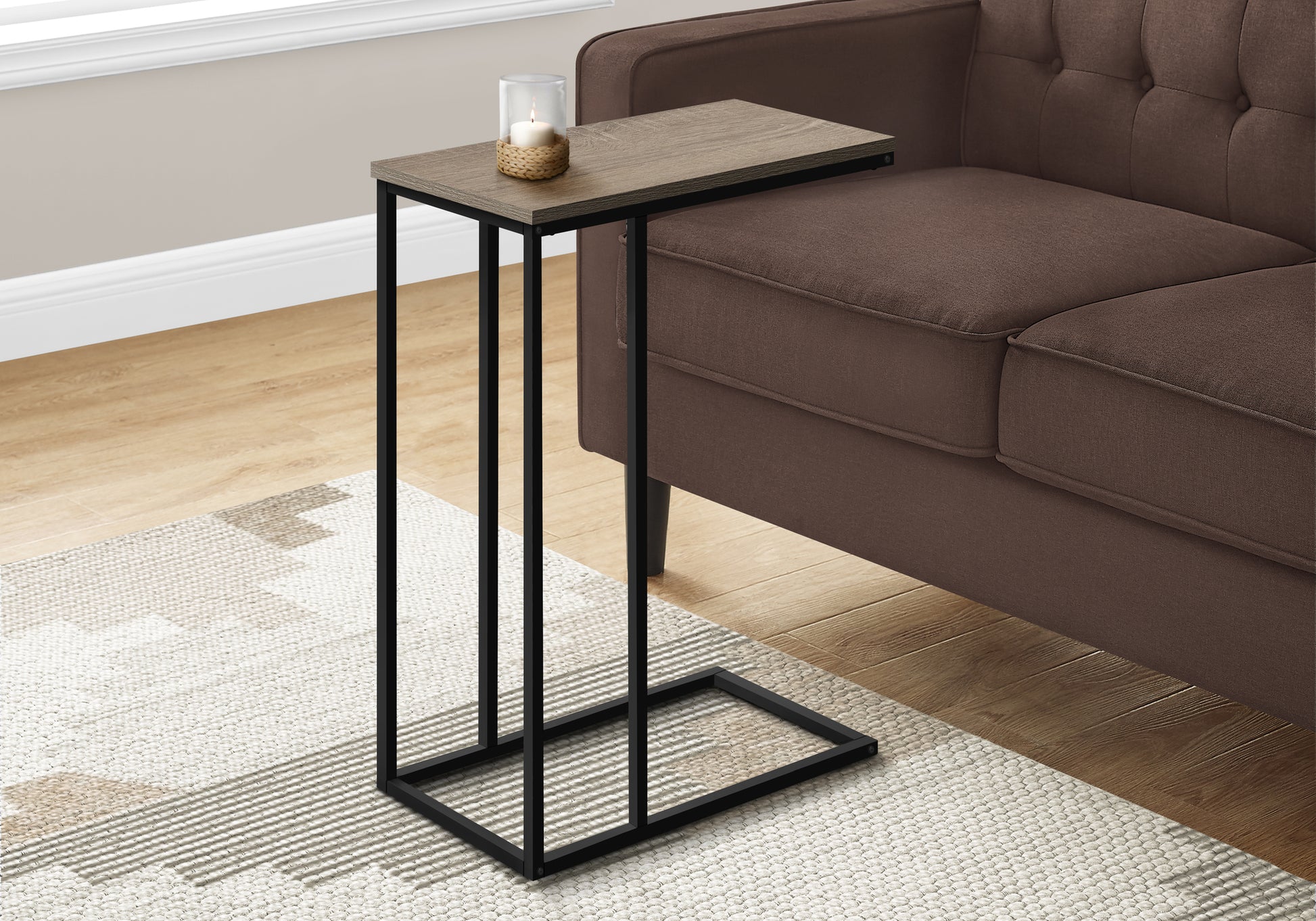 Modern Ctable with weathered oak top and black metal frame perfect for sofa use