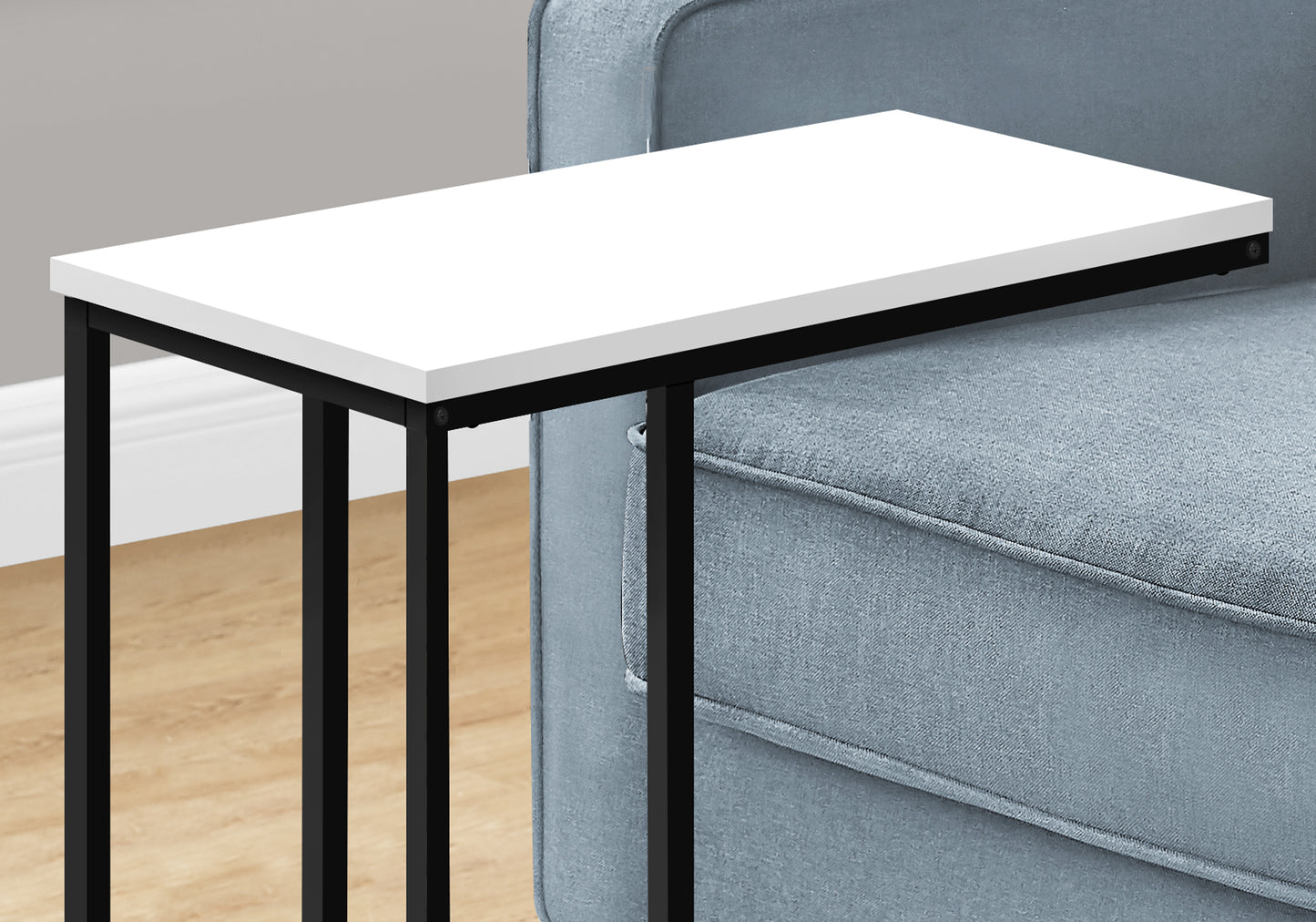 Sleek white rectangular end table with black metal frame perfect for sofa side use