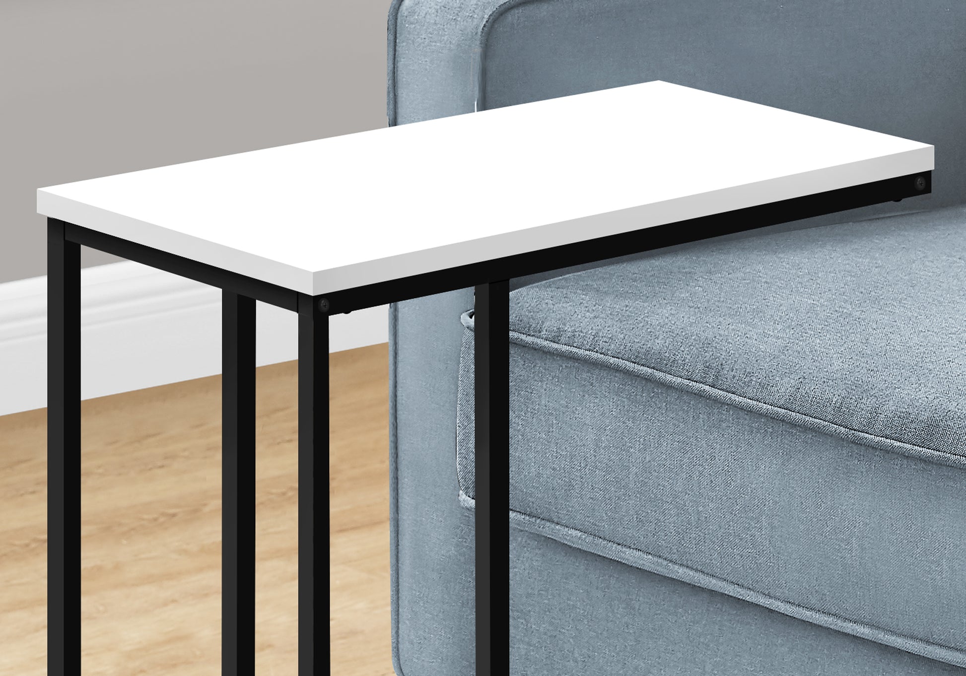 Sleek white rectangular end table with black metal frame perfect for sofa side use