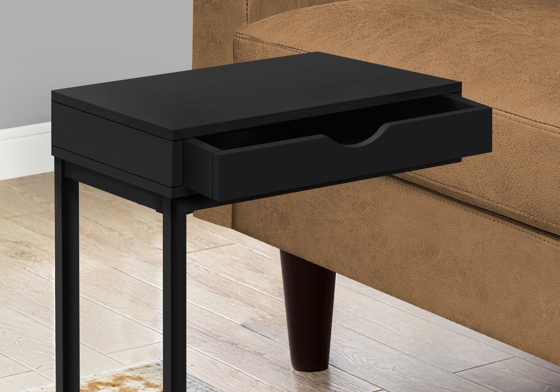 Sleek black end table with an open drawer ideal for modern living room decor