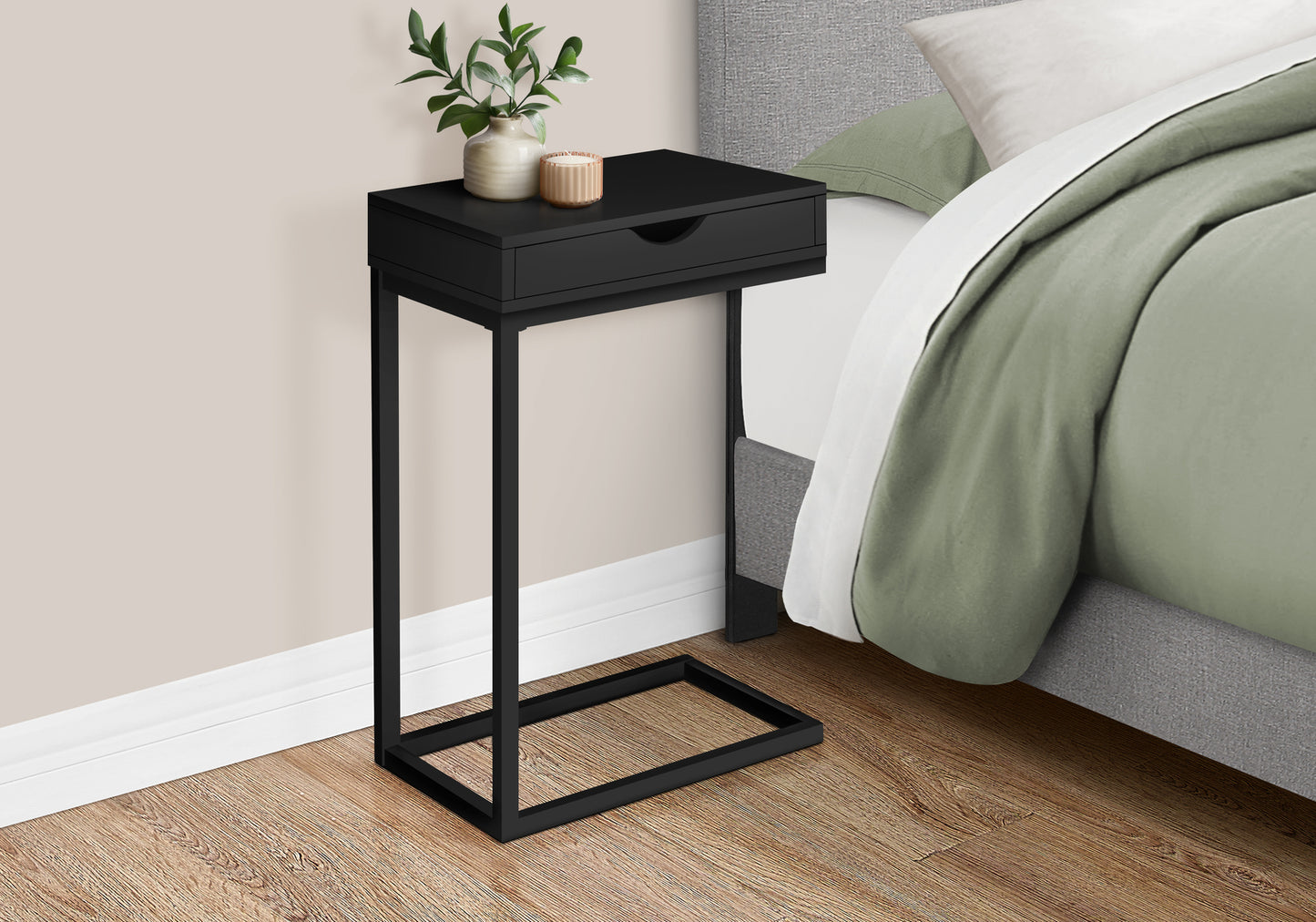 Sleek black Ctable with drawer perfect for modern bedside convenience