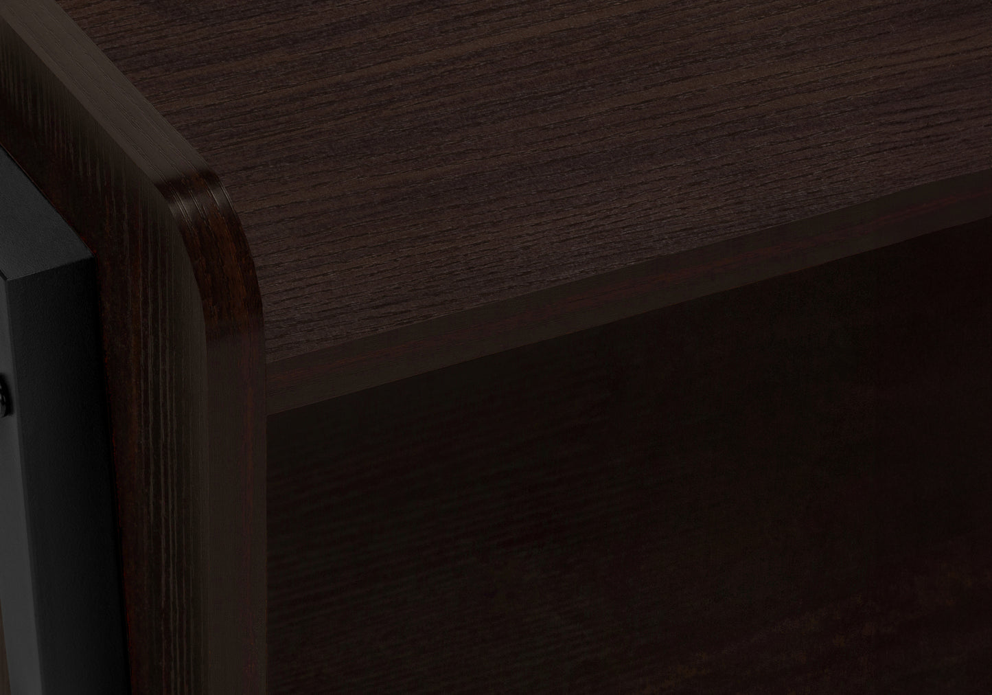 Dark wood veneer shelf edge with rounded corner detail