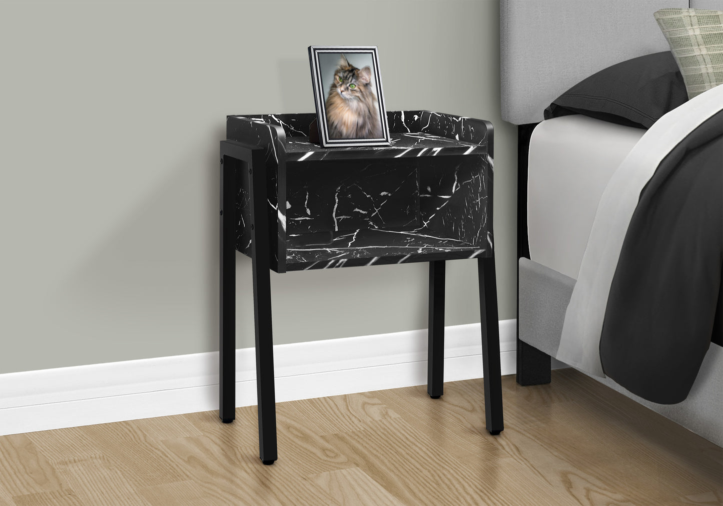 Modern black marble nightstand with sleek metal legs perfect for bedroom decor