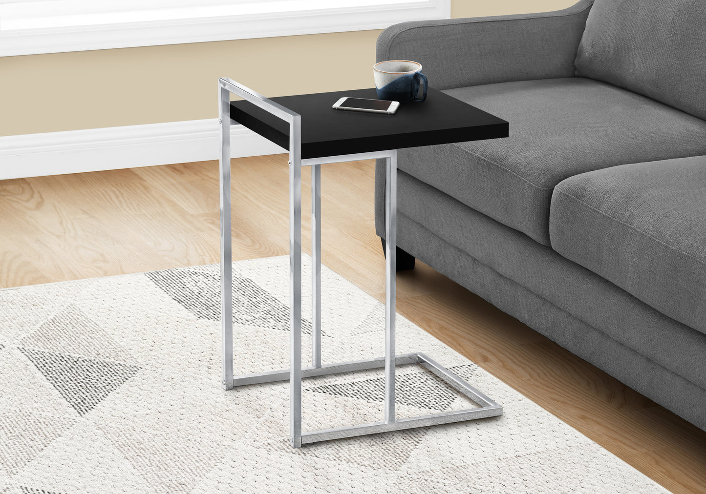 Black Ctable with chrome frame perfect for living room use