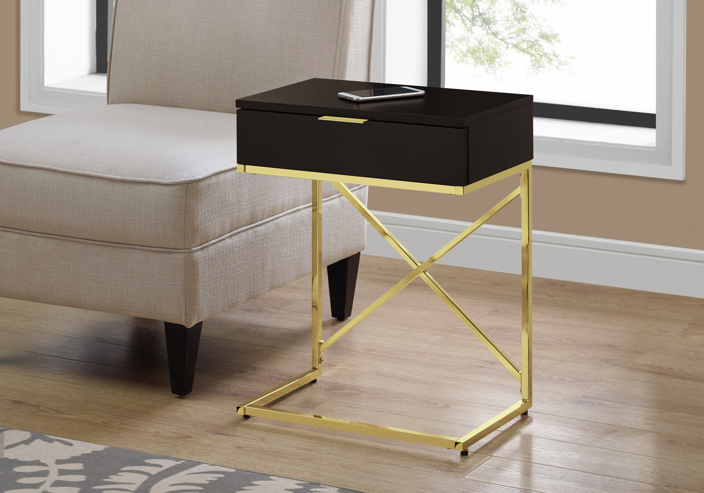 Black ctable with drawer and gold metal base perfect for modern living rooms