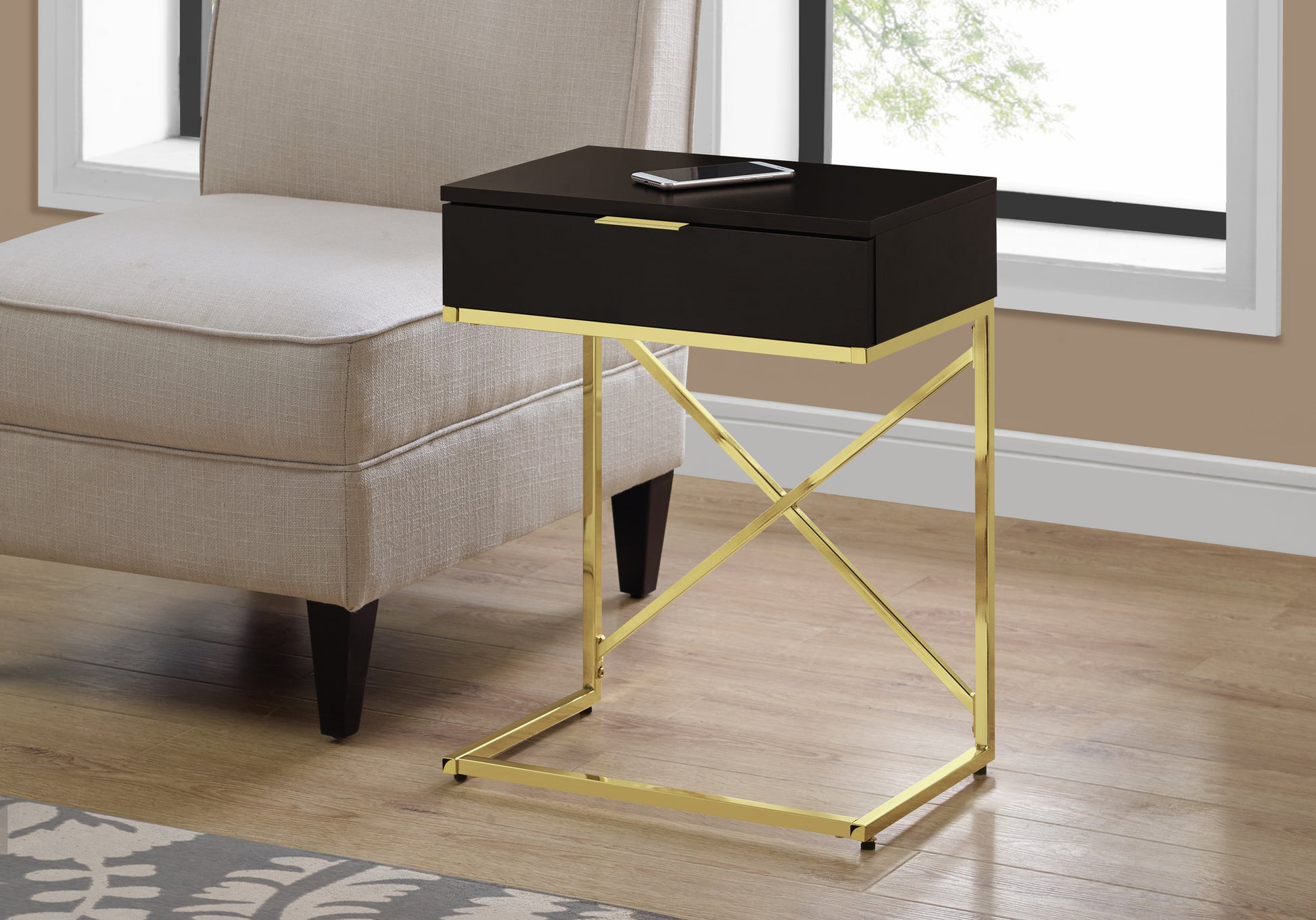 Black ctable with drawer and gold metal base perfect for modern living rooms