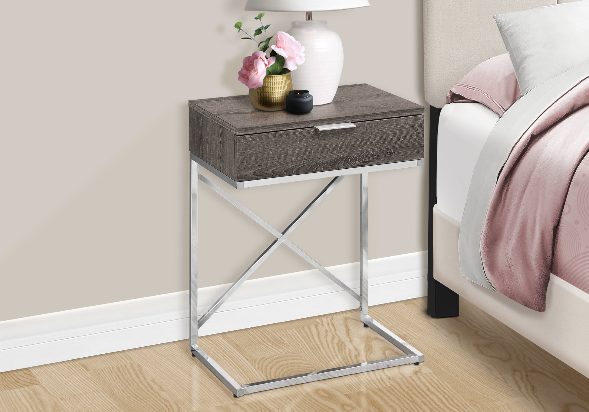Gray wood grain accent table with a chrome Xframe base ideal for bedside storage