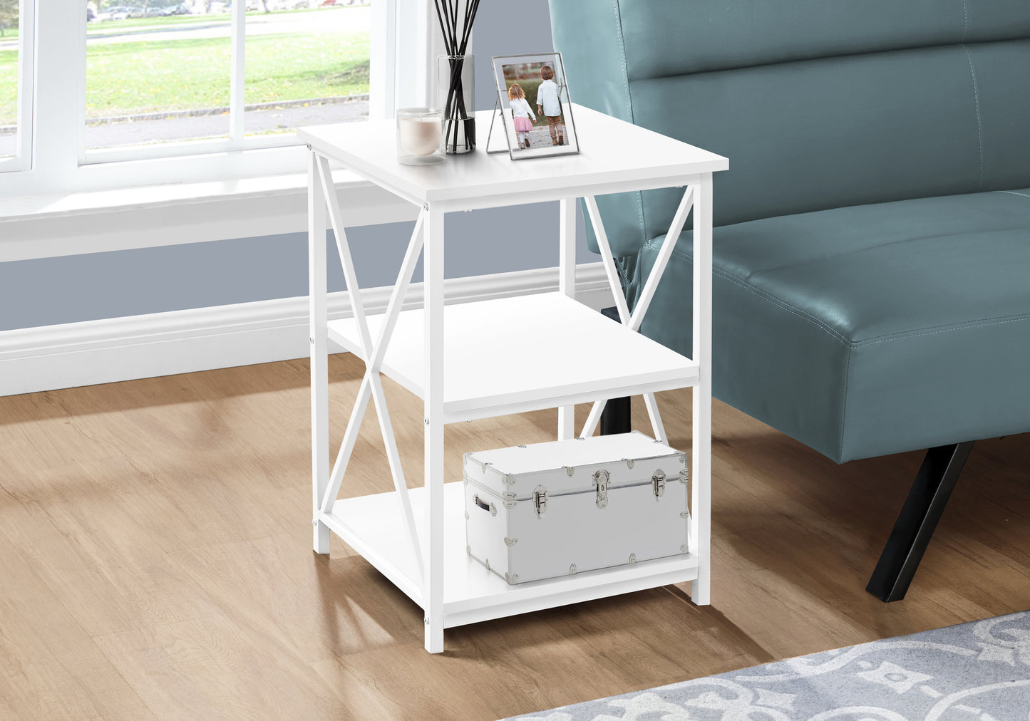 White wooden accent table with two shelves and Xshaped legs