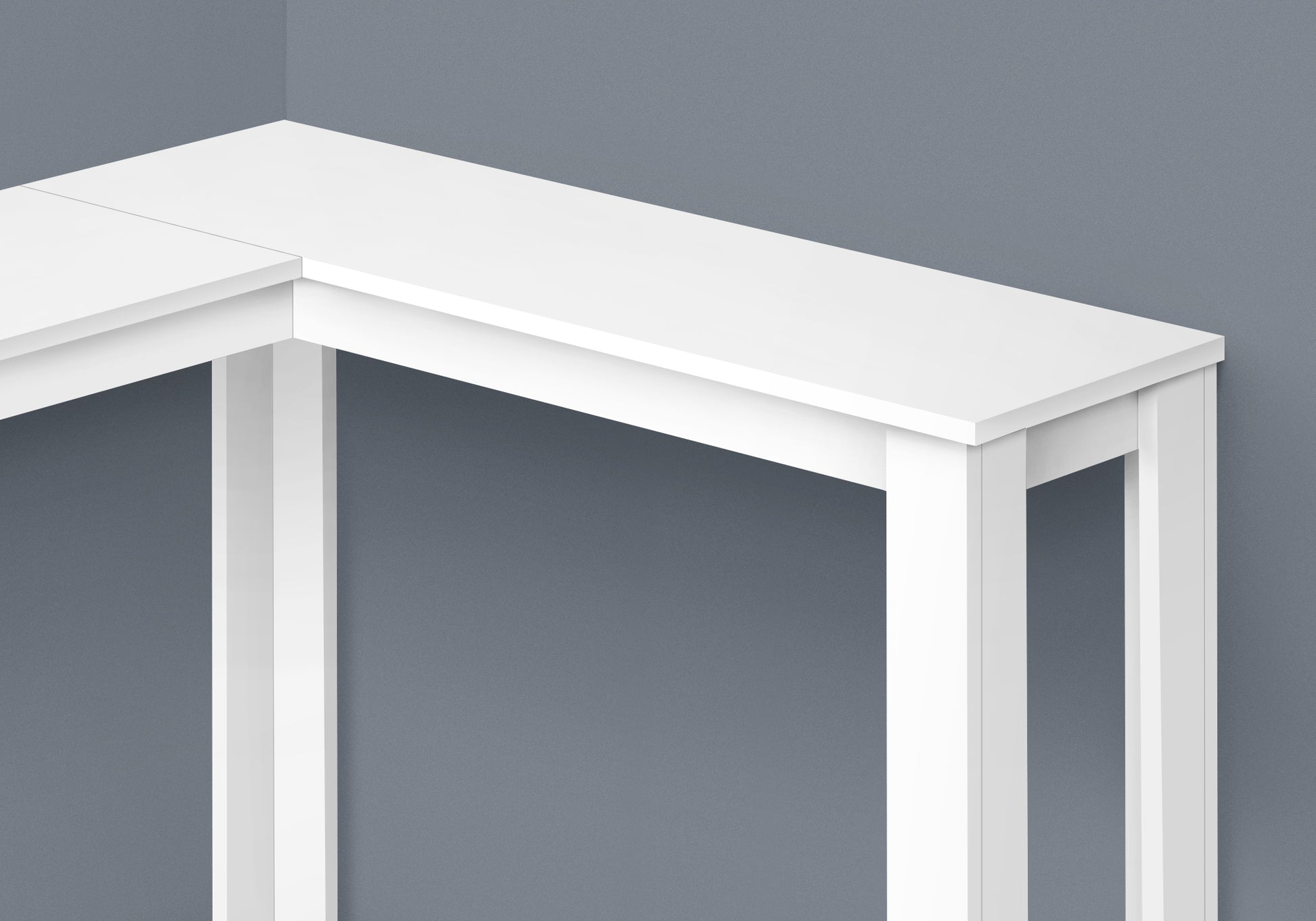 White modern Lshaped desk corner with clean lines and sturdy white legs