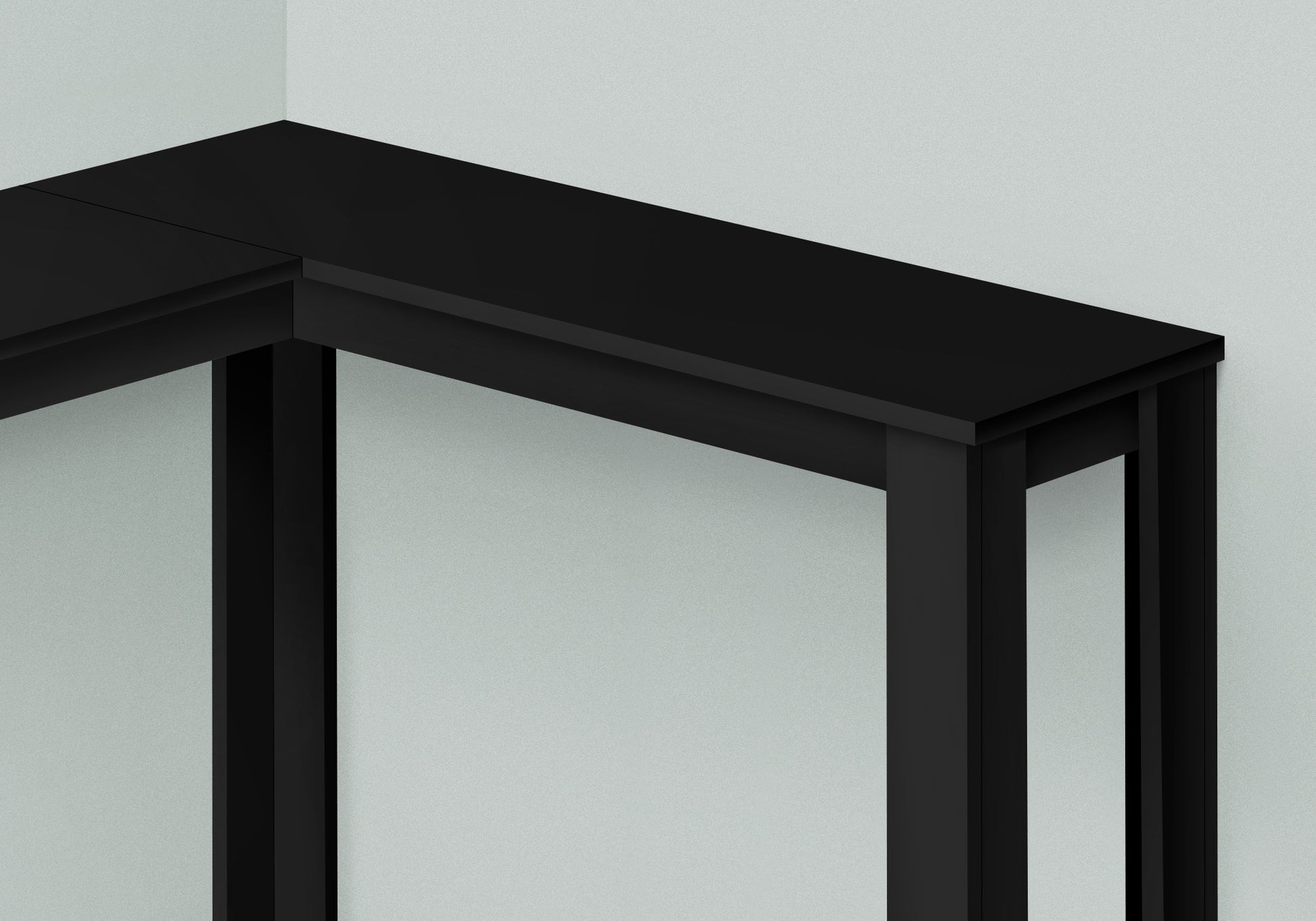 Black minimalist console table with clean lines and modern design