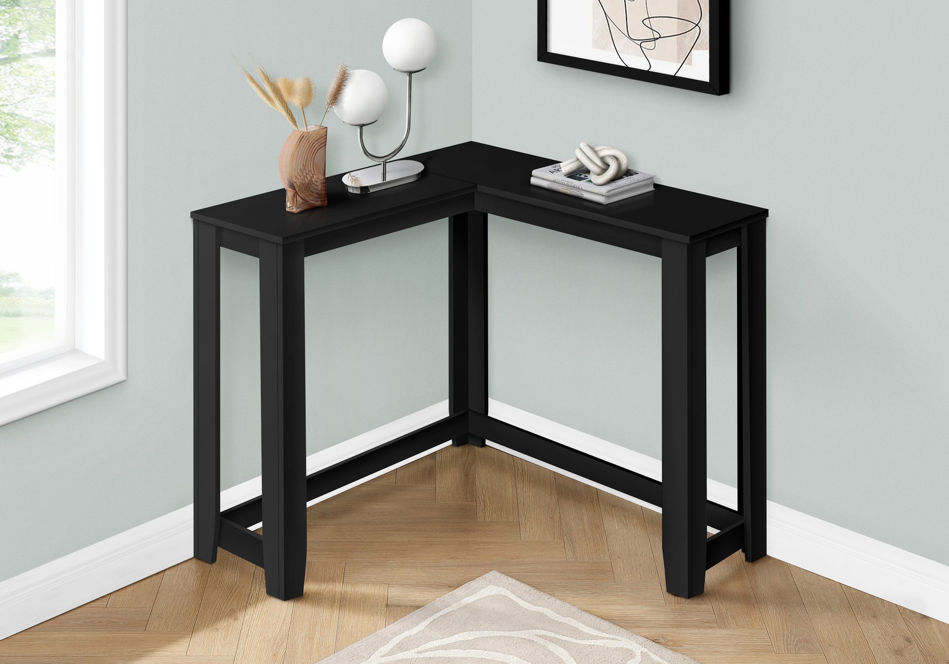 Black corner desk with modern minimalist design