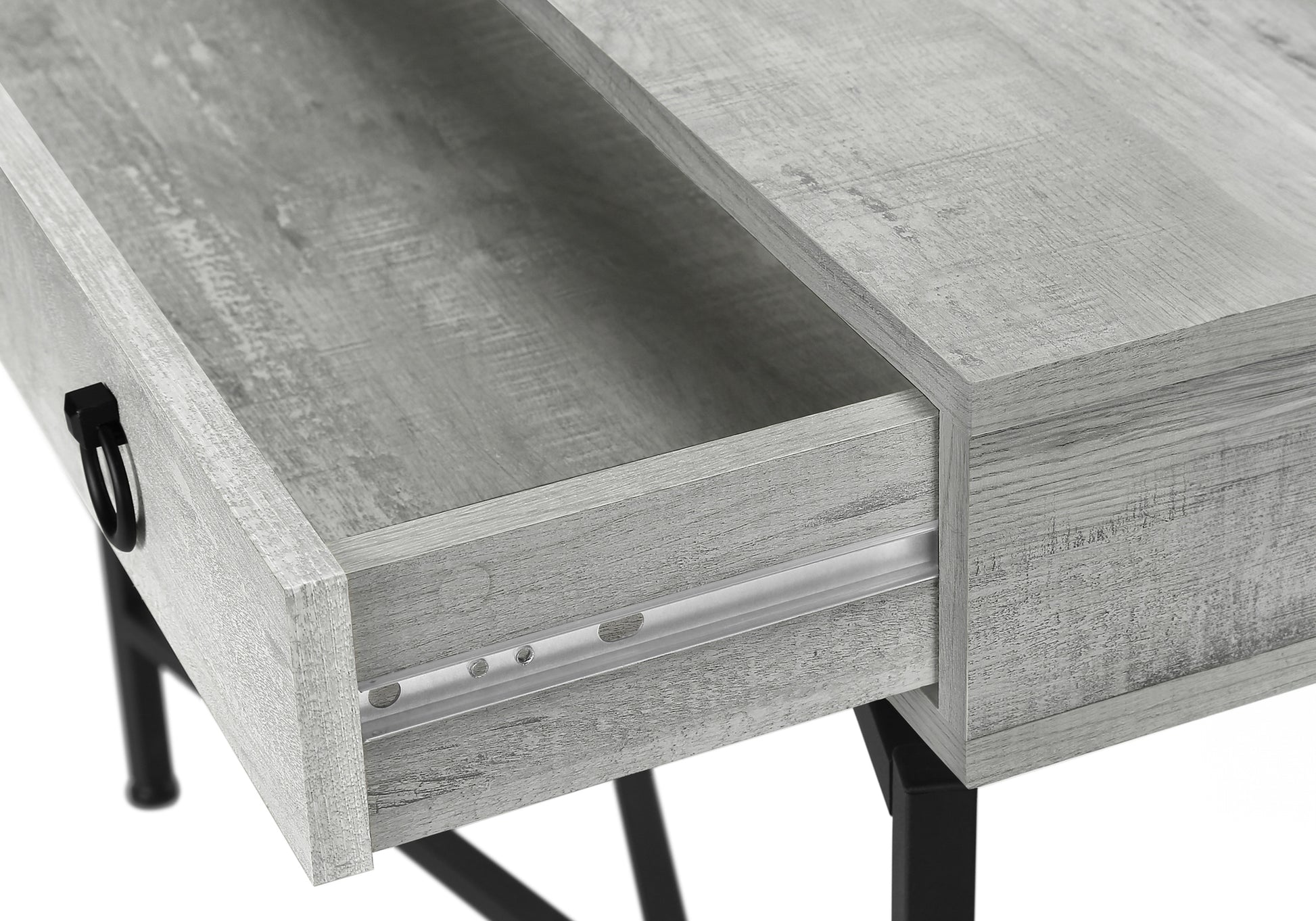 Light grey rustic wood desk drawer with black ring pull showcasing ball bearing slides