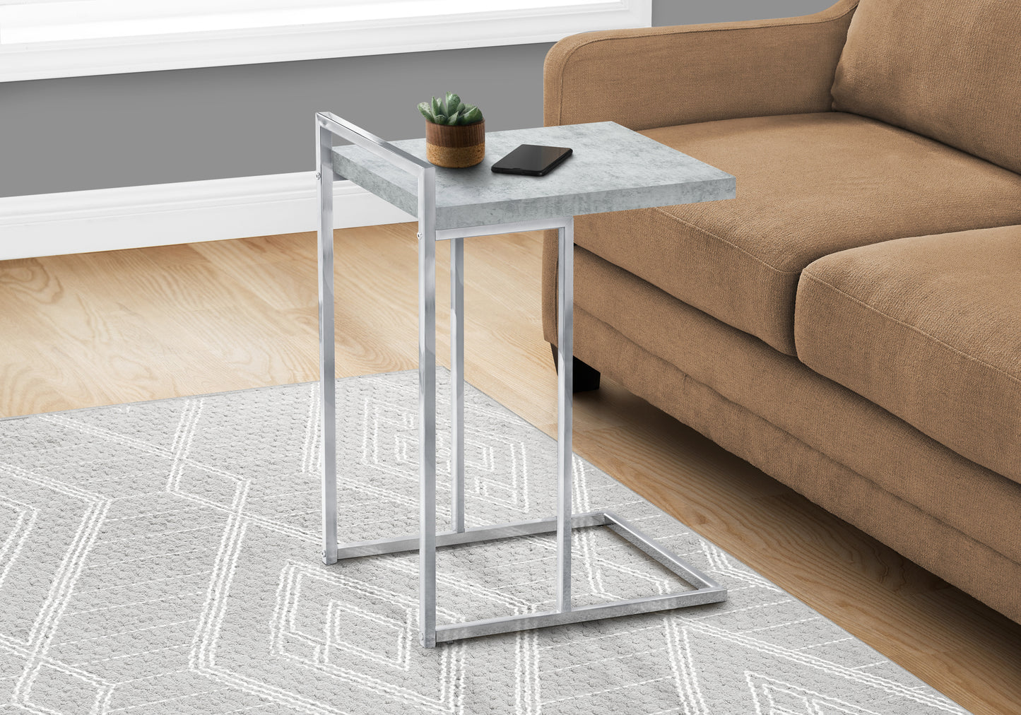 Silver metal Ctable with faux concrete top perfect for small spaces