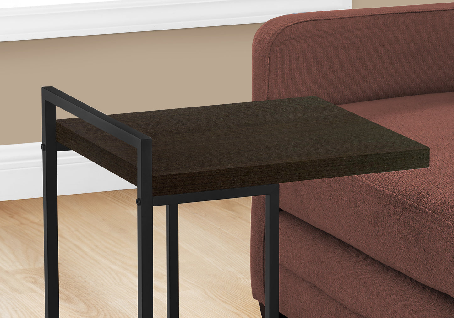 Dark wood C table with black metal frame perfect for sofa use