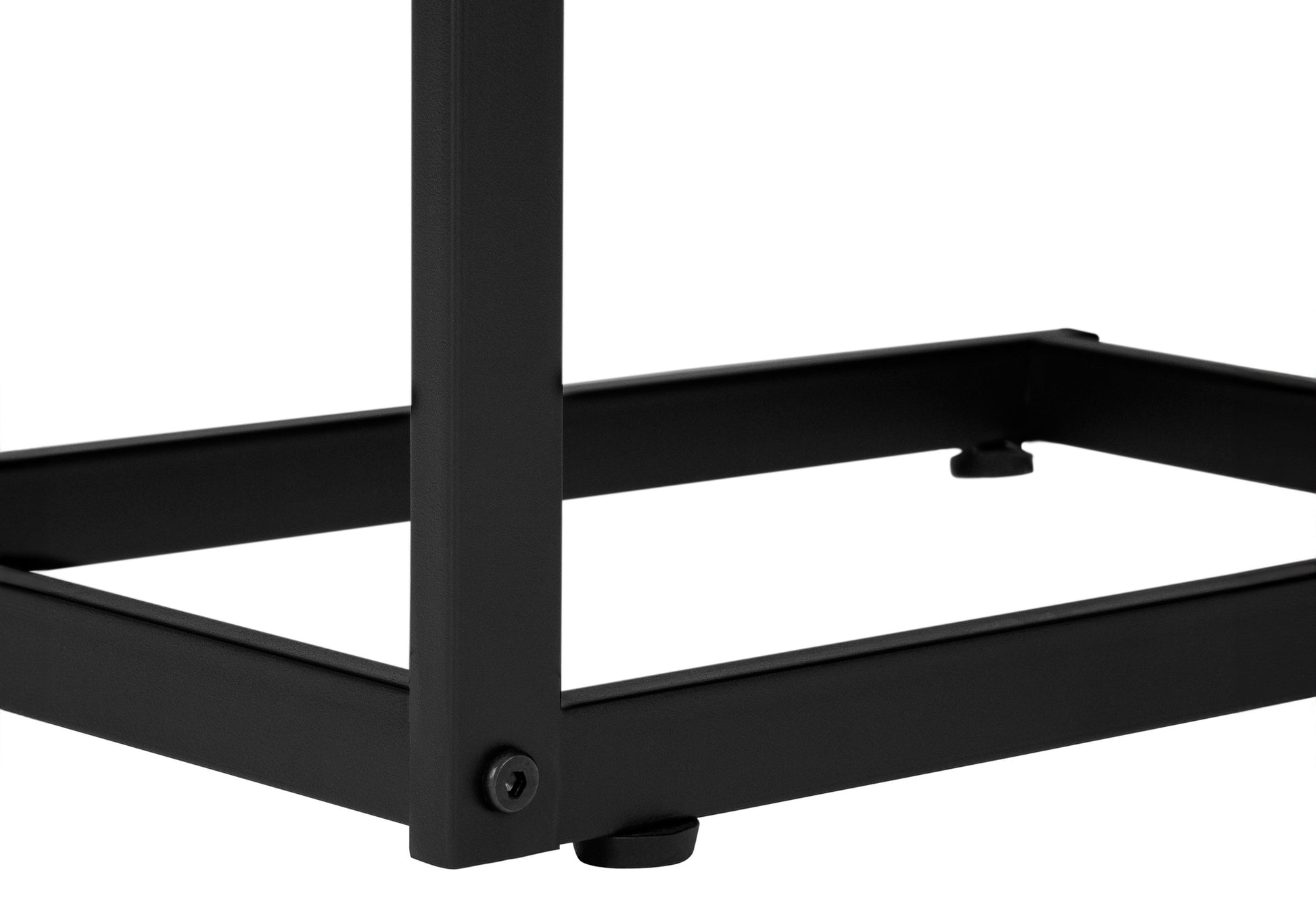 Closeup of black metal frame base with visible bolt detail on leg