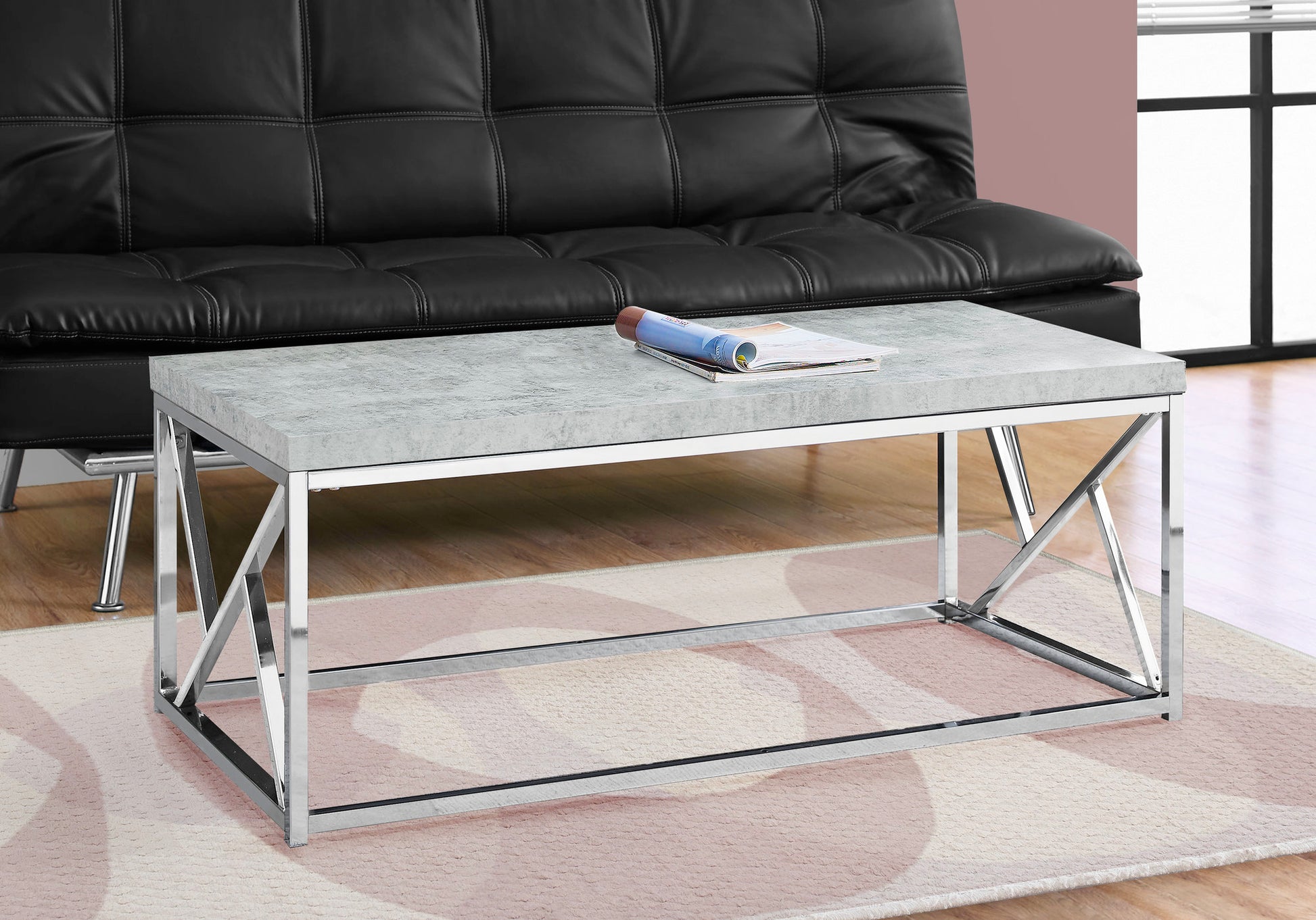 Modern concrete top coffee table with chrome Xleg frame