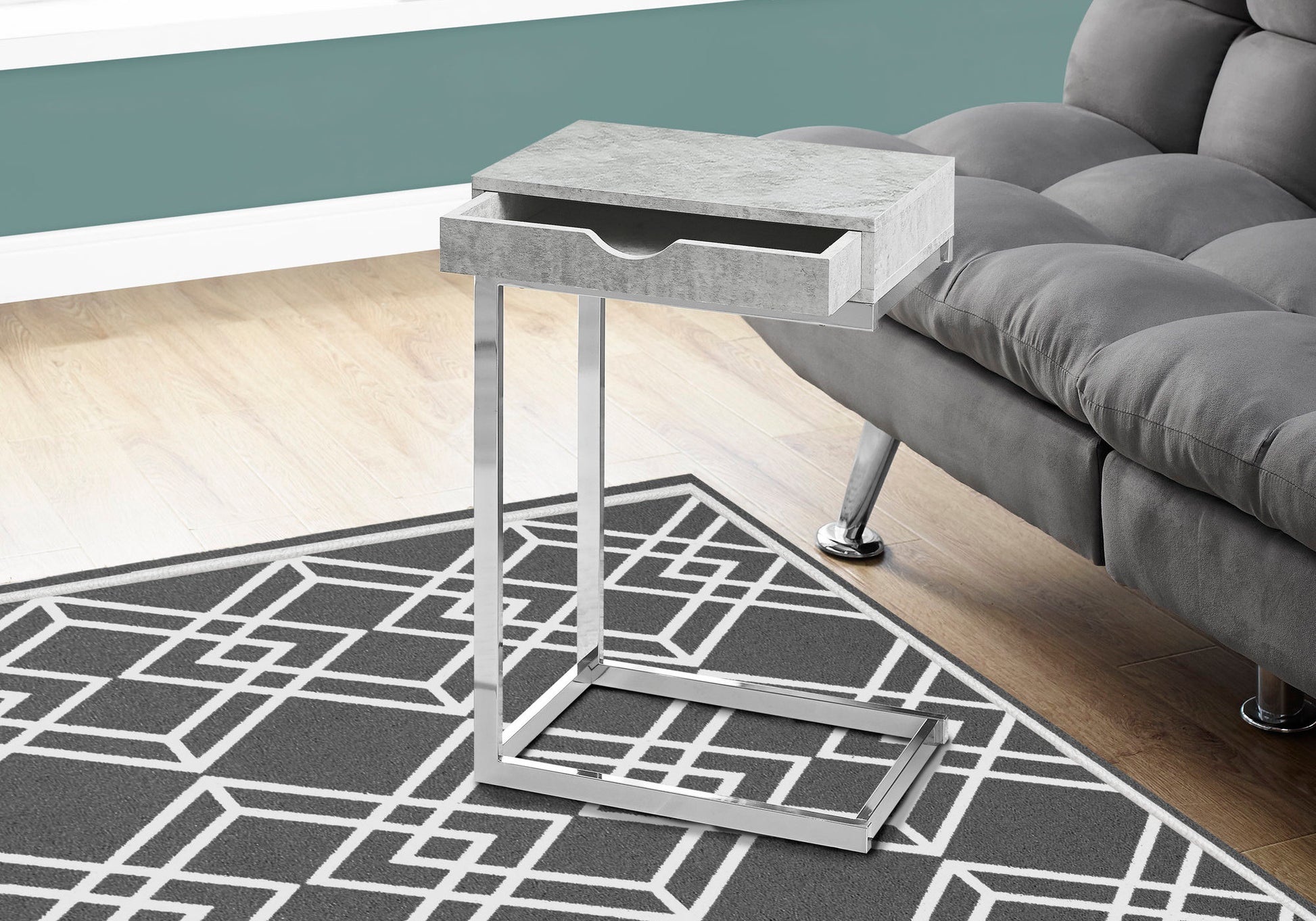 Modern grey ctable with a single drawer and chrome legs perfect for sofa side use