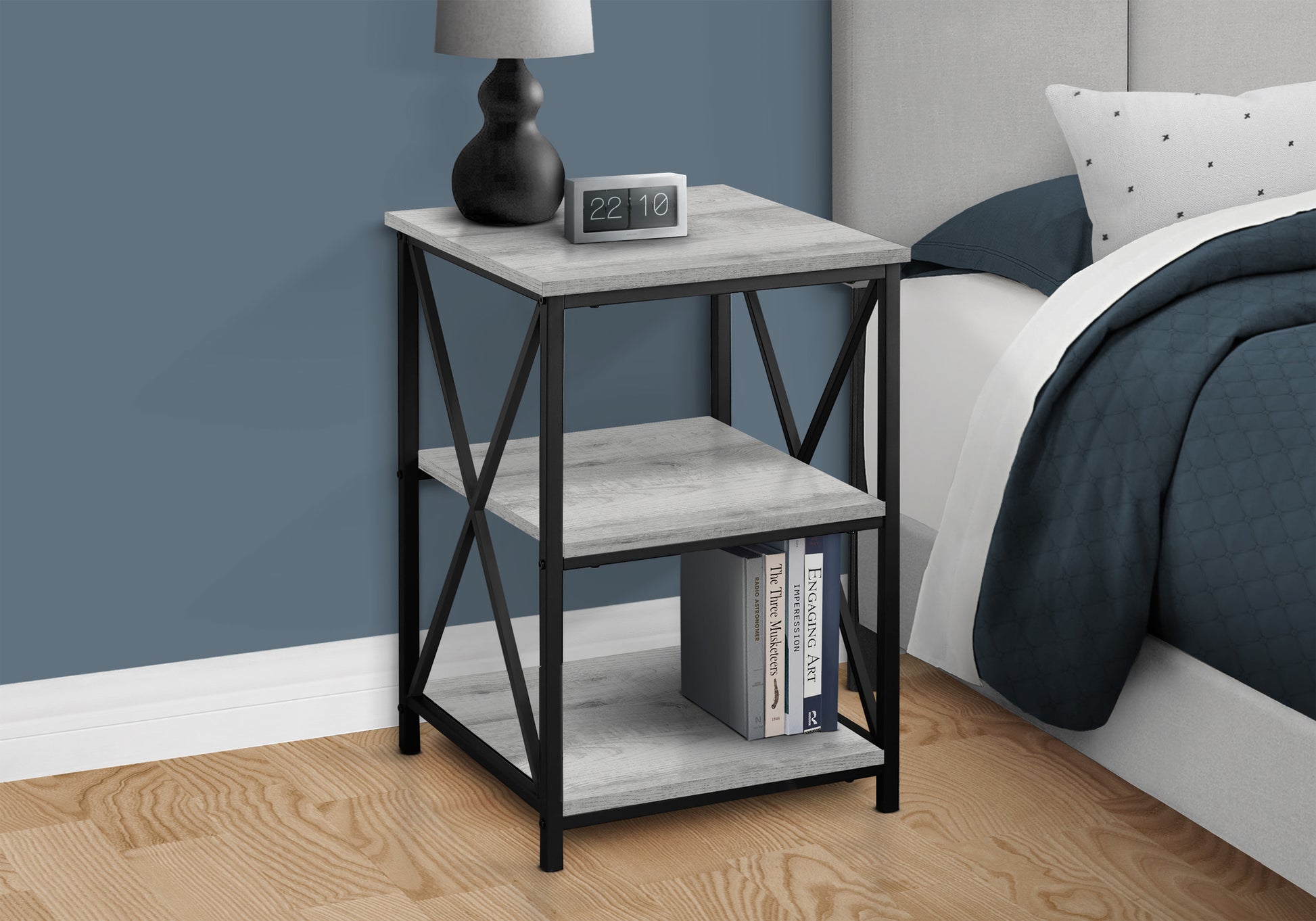 Industrial style nightstand with weathered gray wood finish and black metal frame