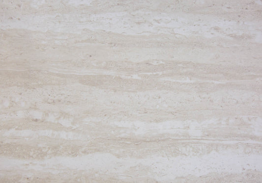 Closeup of light beige travertine tile with natural horizontal veining