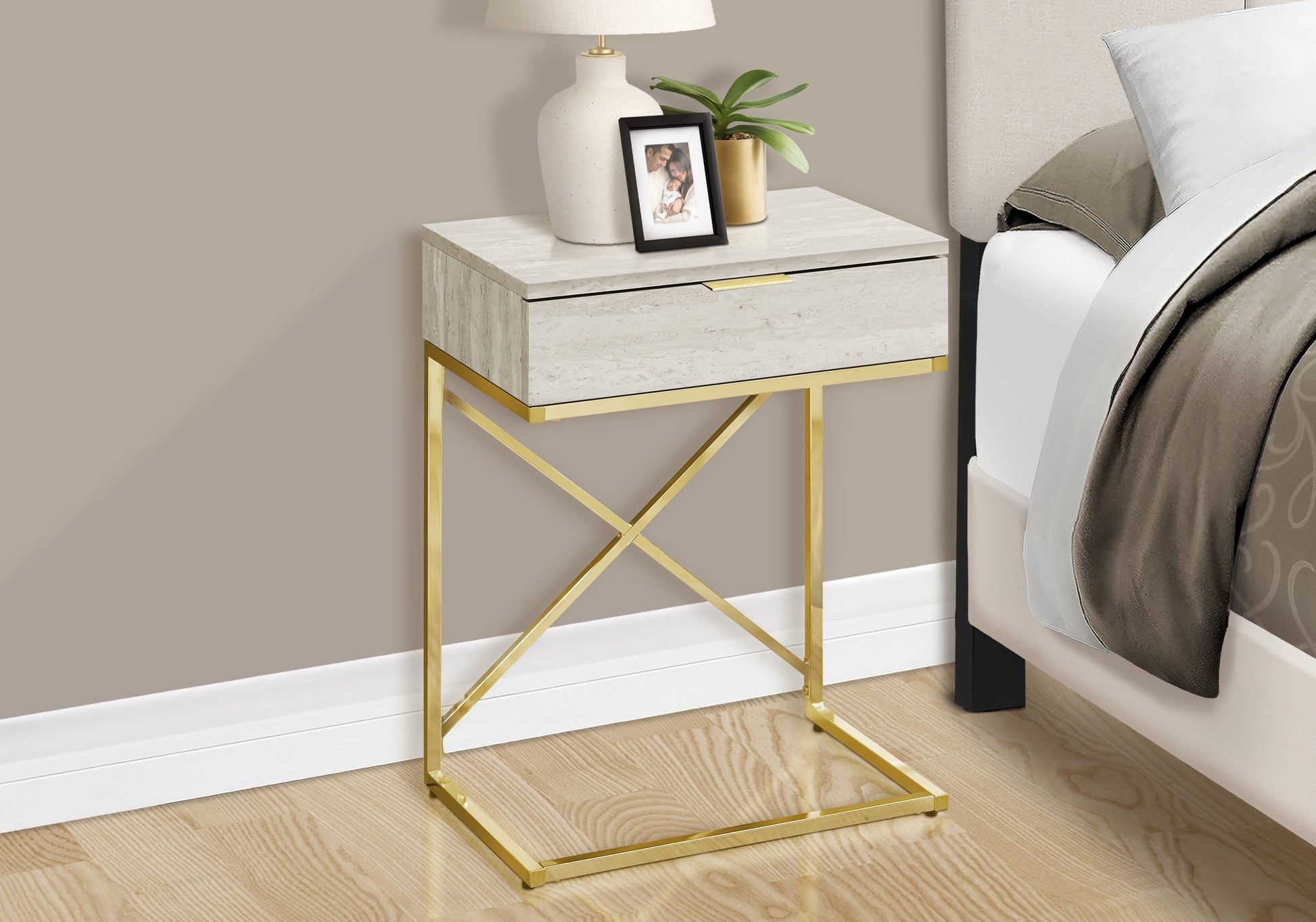 Modern Ctable with beige travertine top and gold metal frame