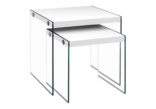Stacking white nesting tables with clear acrylic sides and chrome accents