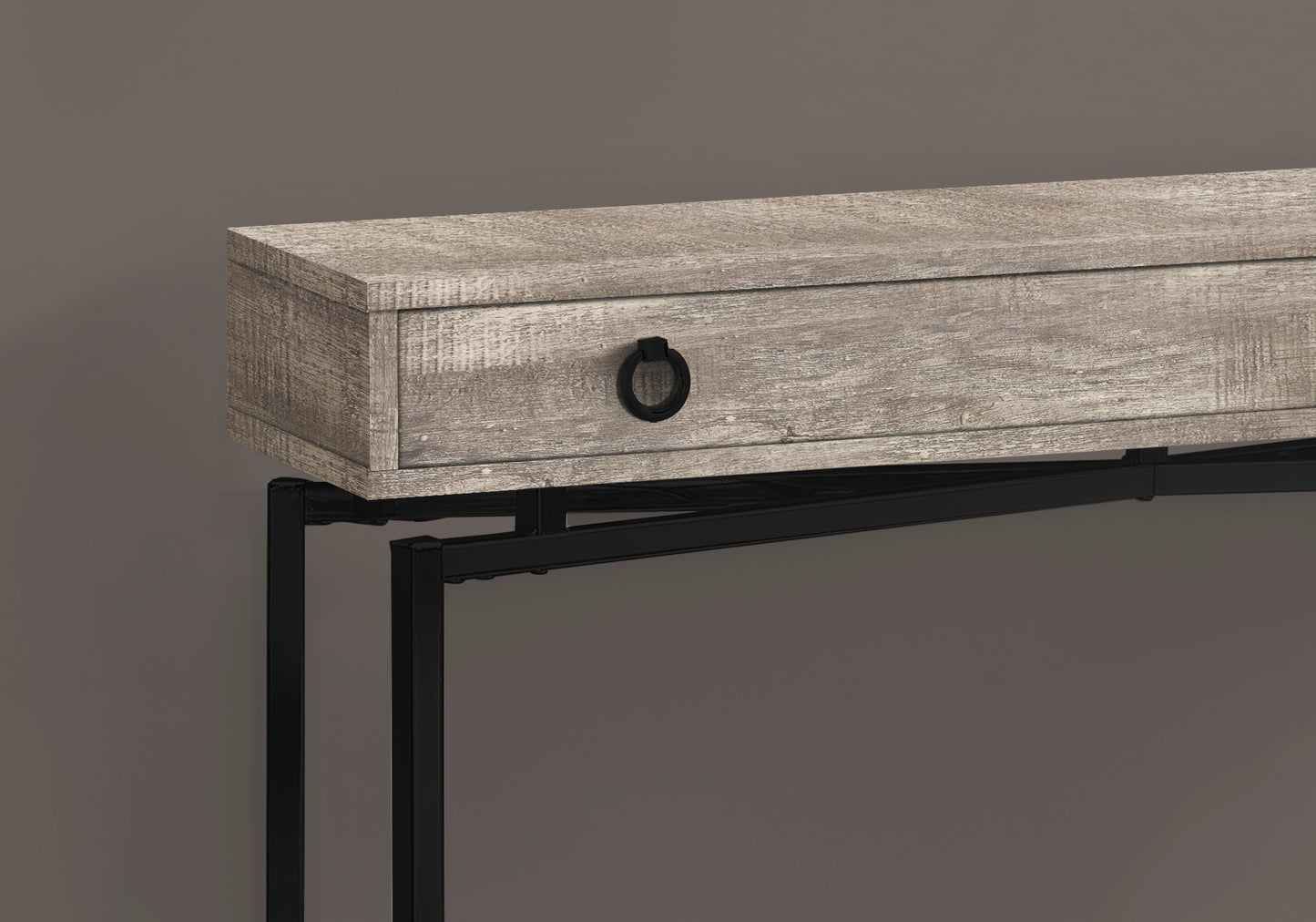 Weathered grey wood console table with black metal legs and drawer pull