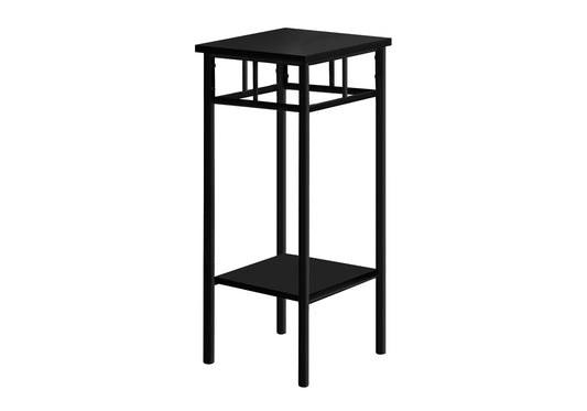 Tall black metal plant stand with geometric design perfect for showcasing indoor plants