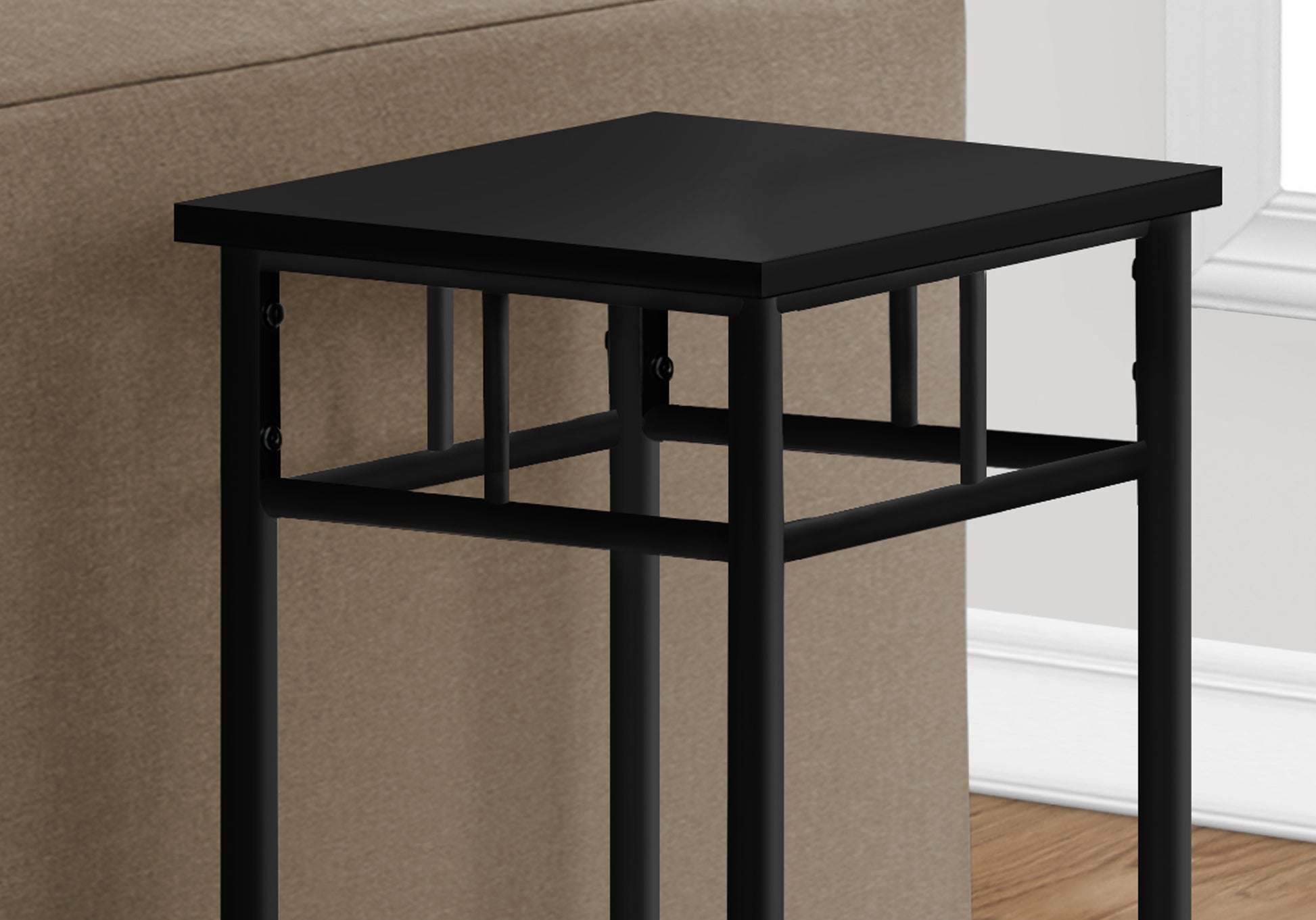 Minimalist black end table with metal frame perfect for modern living rooms