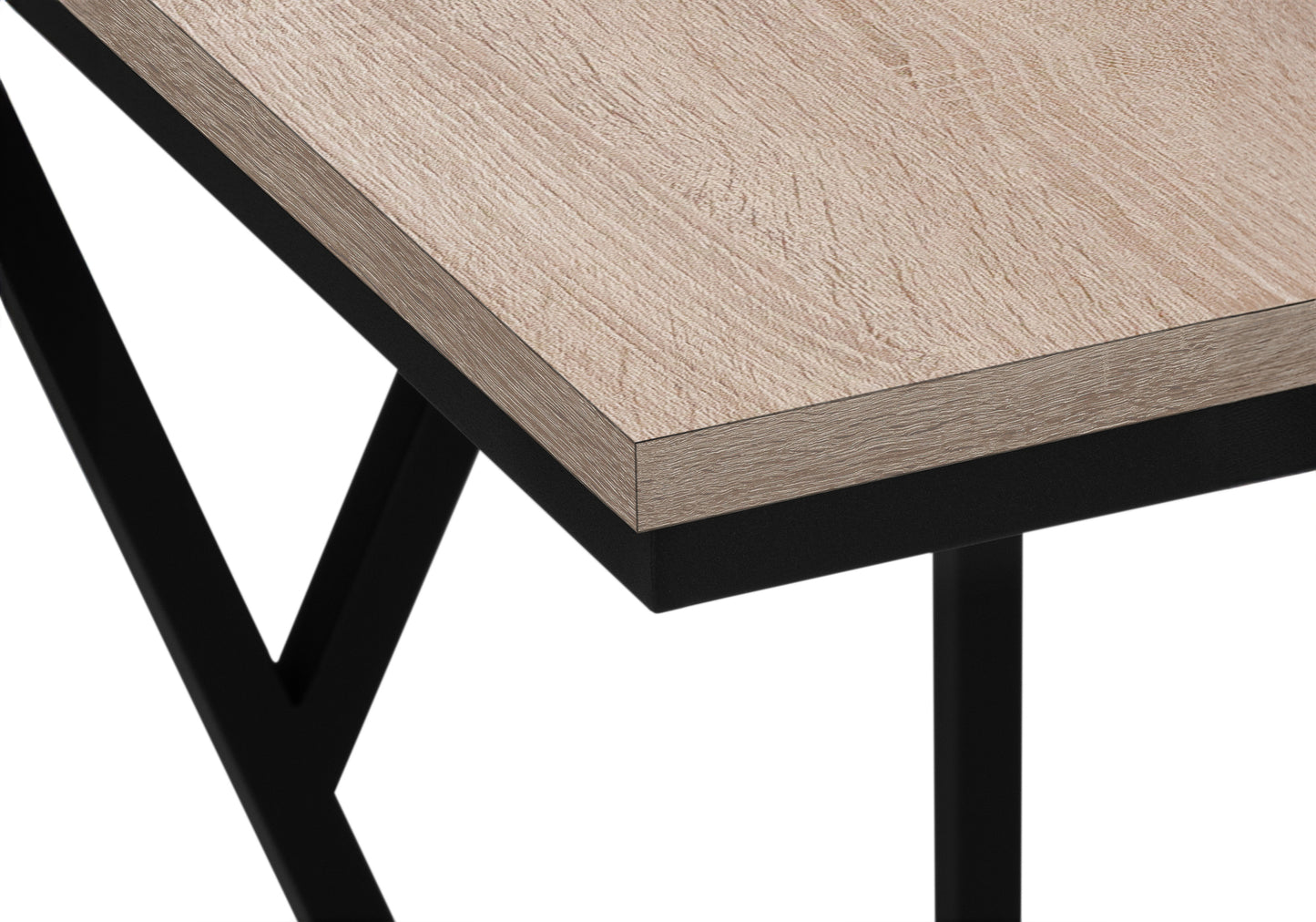 Closeup of a light oak wood desk surface with a matte black metal frame