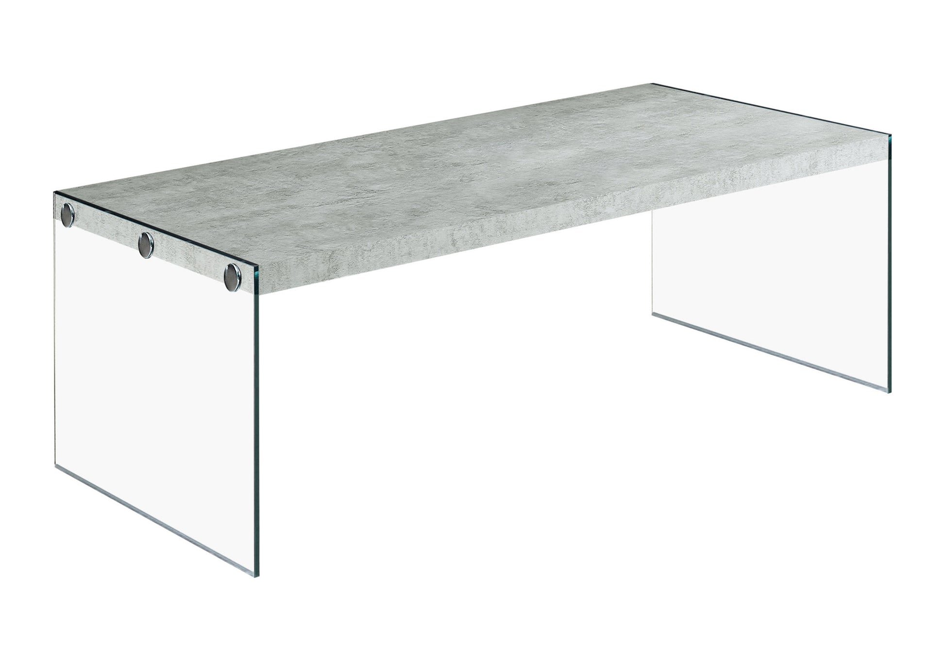 Modern gray concrete top coffee table with clear glass legs and silver accents