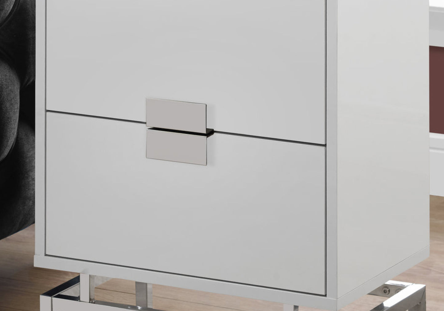 Modern white dresser with sleek silver hardware and chrome legs