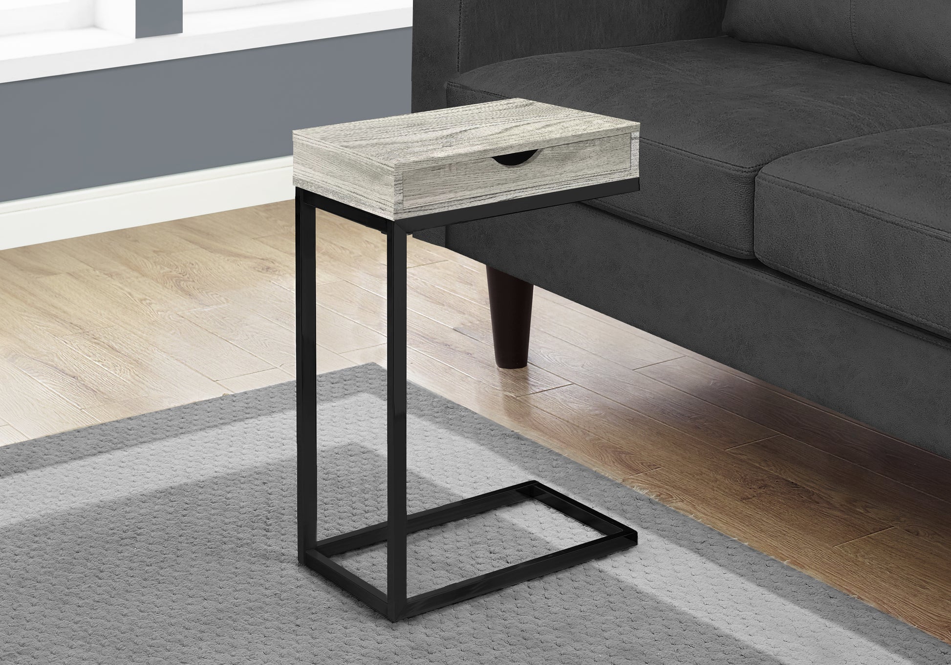 Grey wash wood ctable with black metal frame perfect for living room use