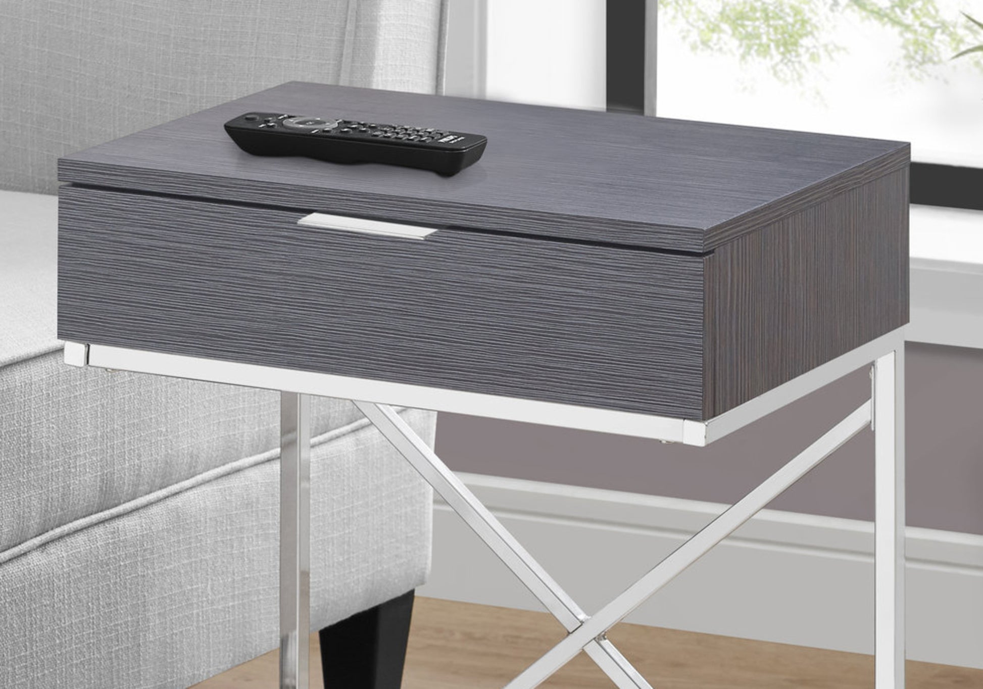 Grey wood grain end table with drawer and silver chrome legs perfect for living room