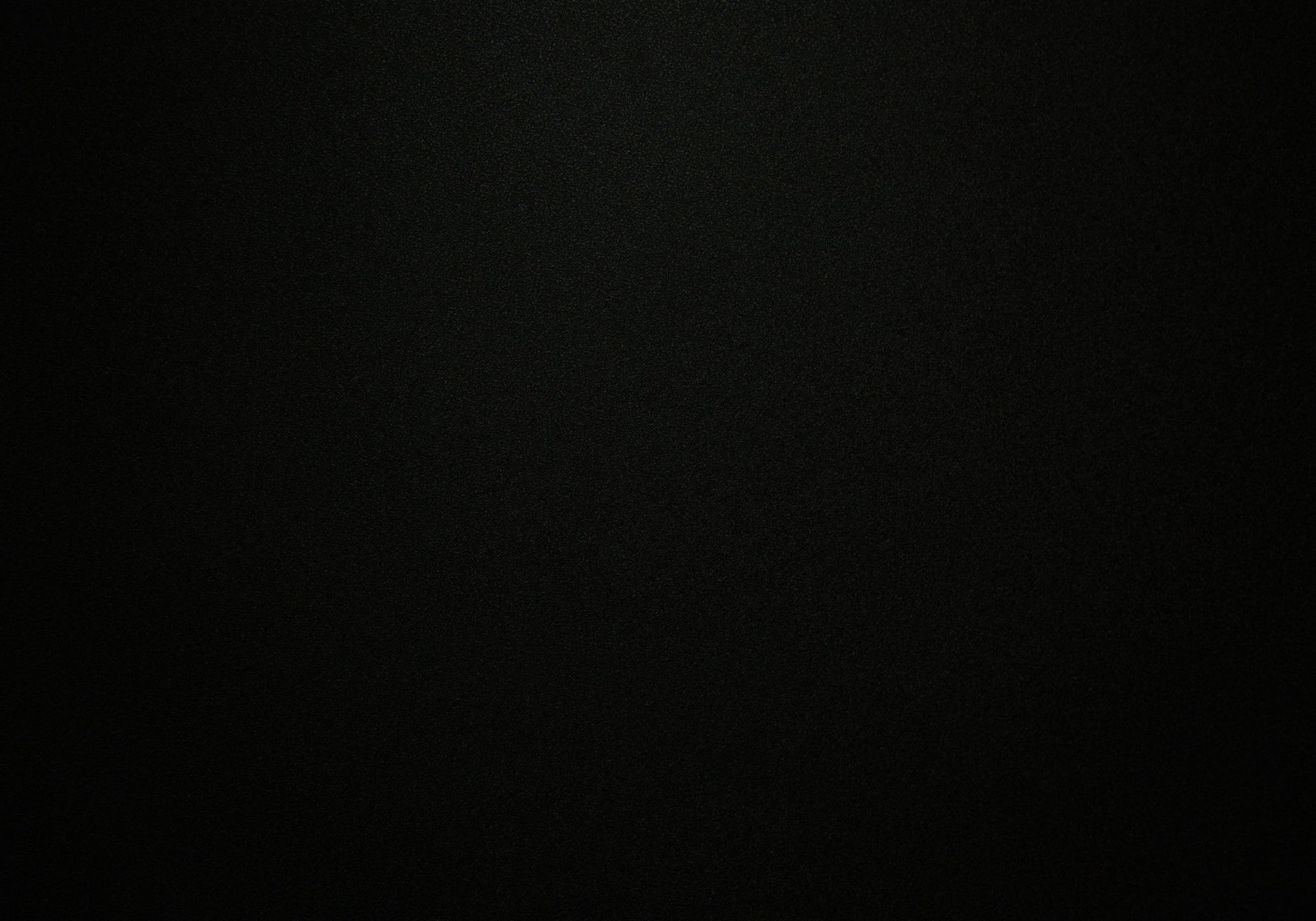 Black textured background for product display