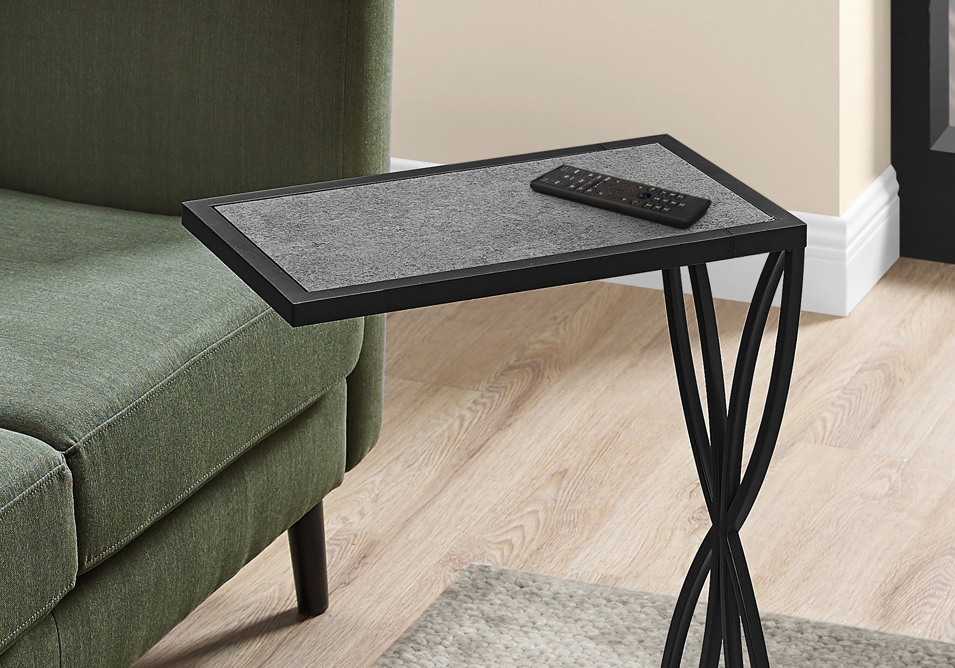 Black metal Ctable with gray textured top perfect for small spaces