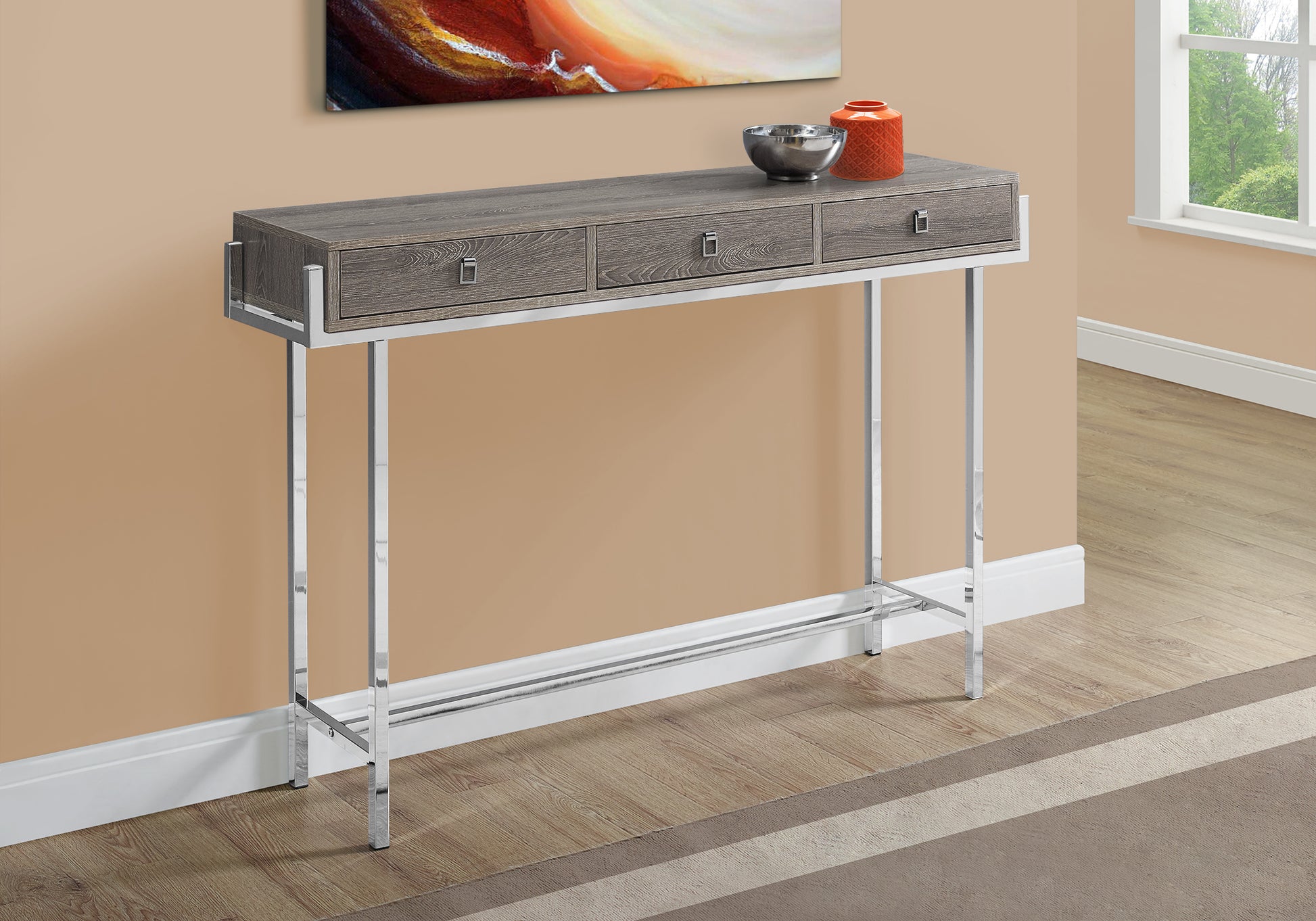 Gray wood finish console table with three drawers and chrome legs