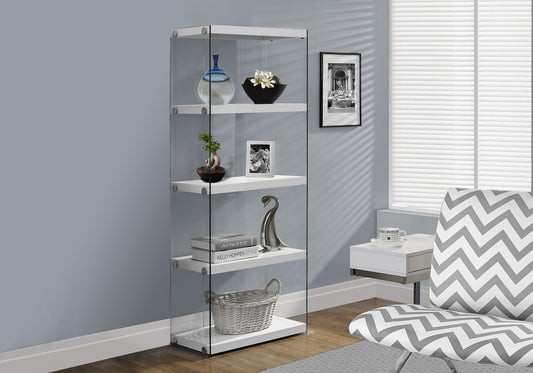 Tall narrow display cabinet with white shelves and clear glass sides showcasing decor items