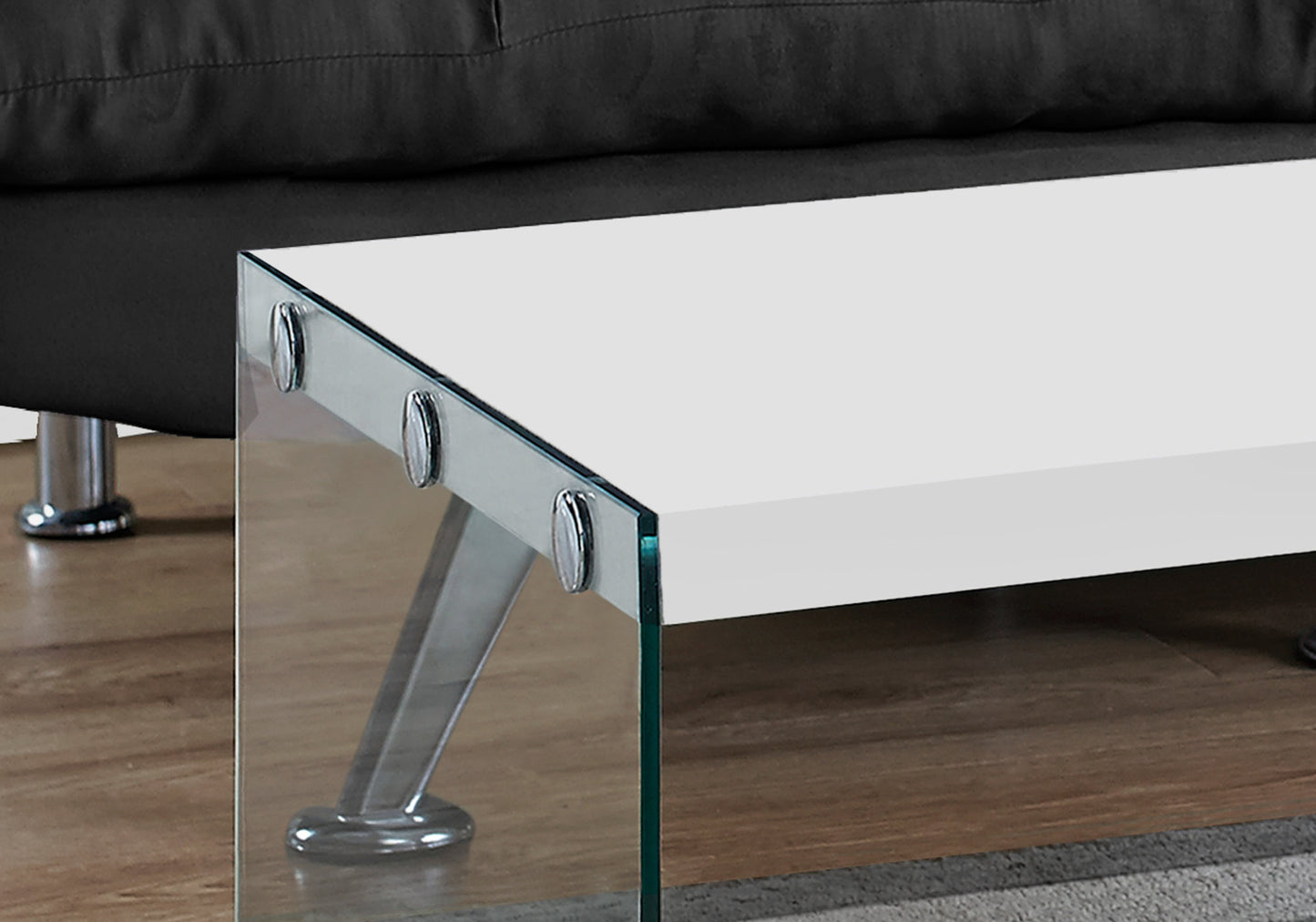 Modern white coffee table with sleek chrome legs and glass side panels