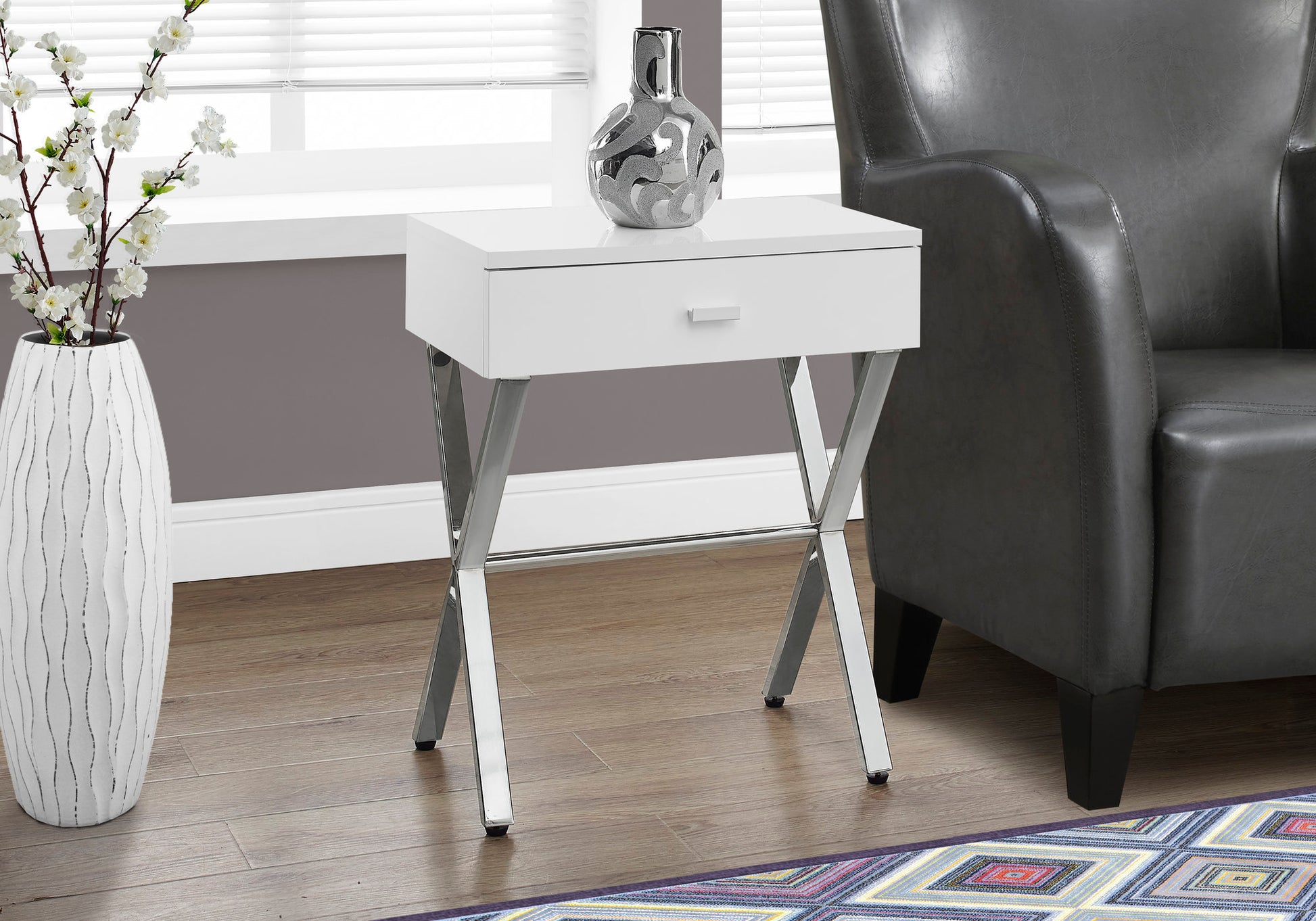 Modern white end table with a single drawer and chrome Xframe legs